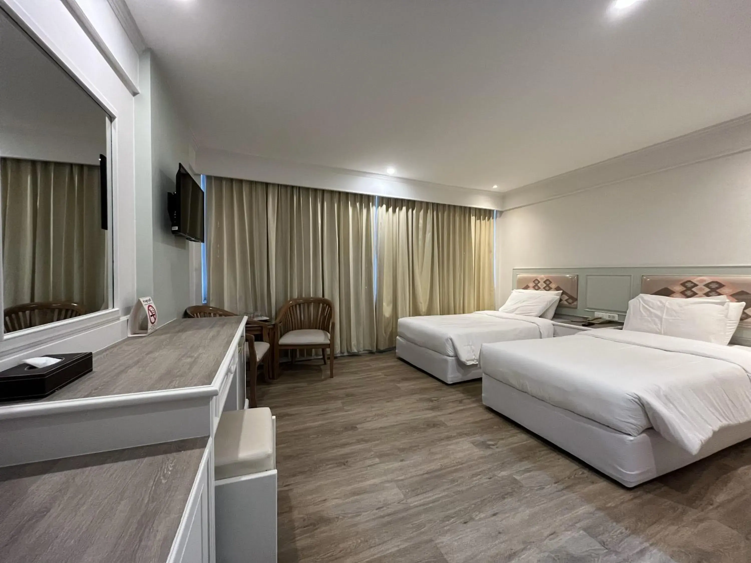 Bedroom in Dhevaraj Hotel