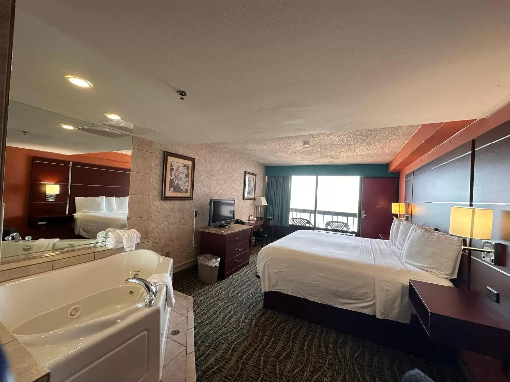 Bedroom in The Breakers Resort Inn