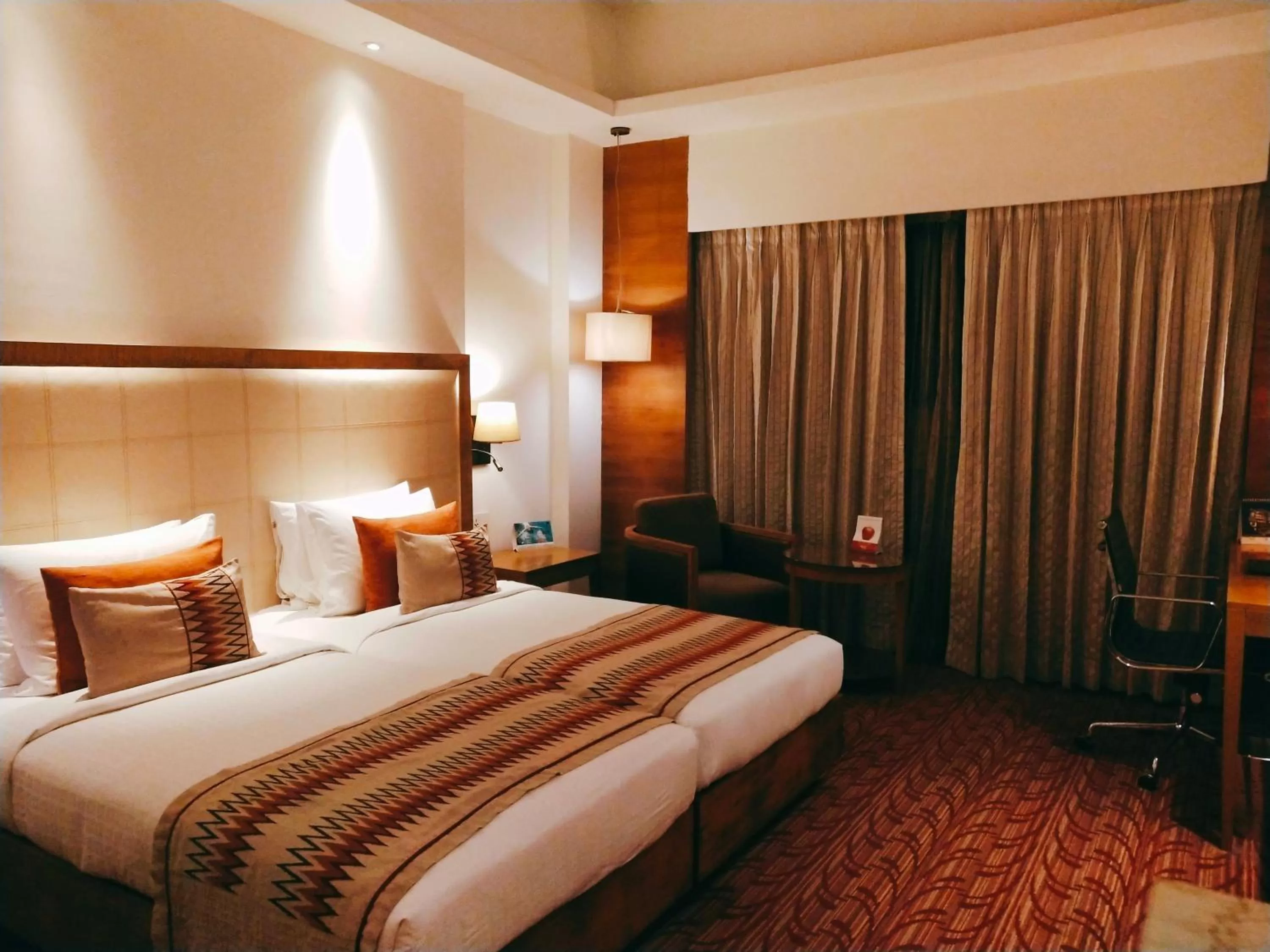 Bed in Pride Plaza Hotel, Kolkata