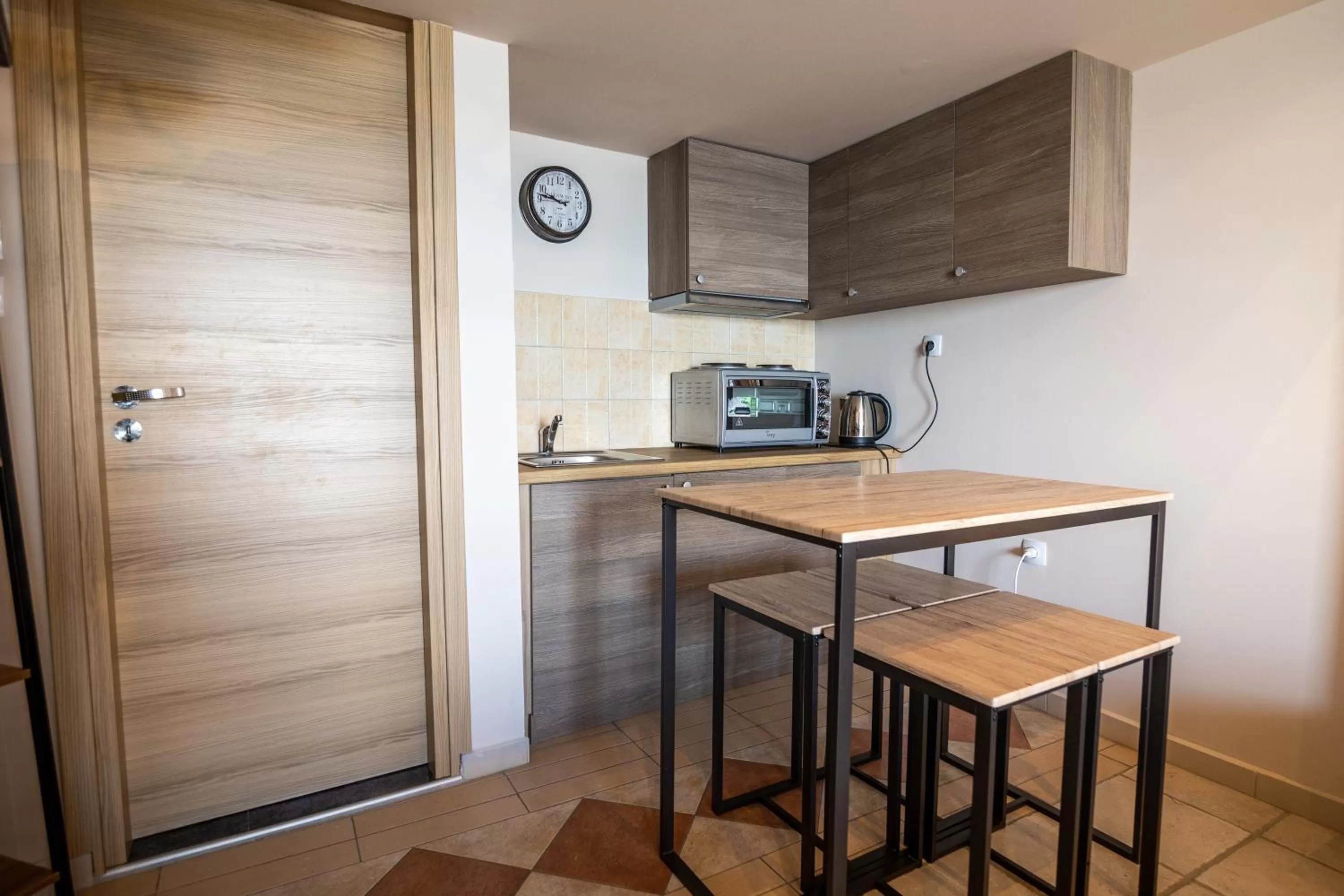Kitchen or kitchenette in Votsalakia Hotel & Luxury Apartments