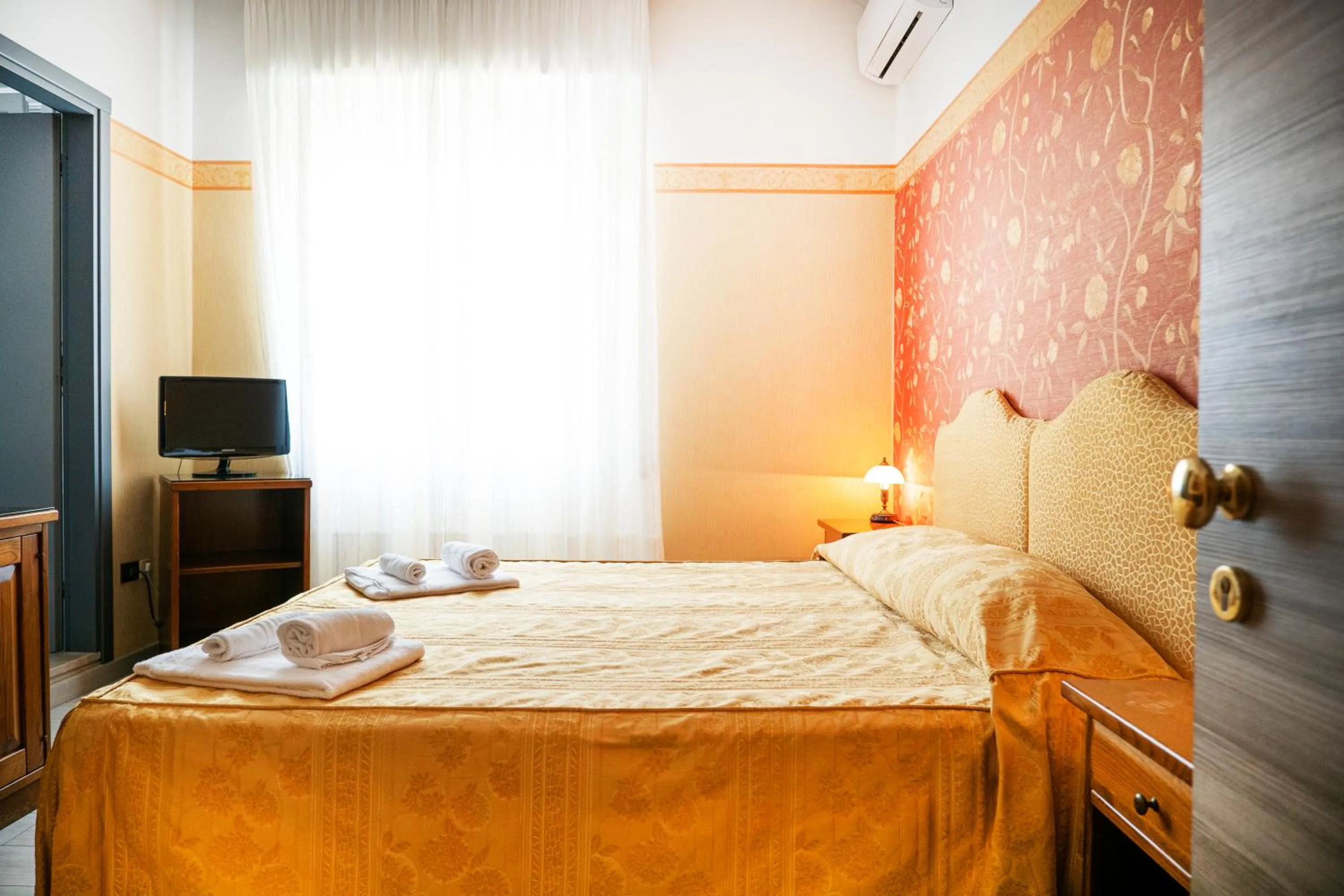 Bed in Hotel Riviera