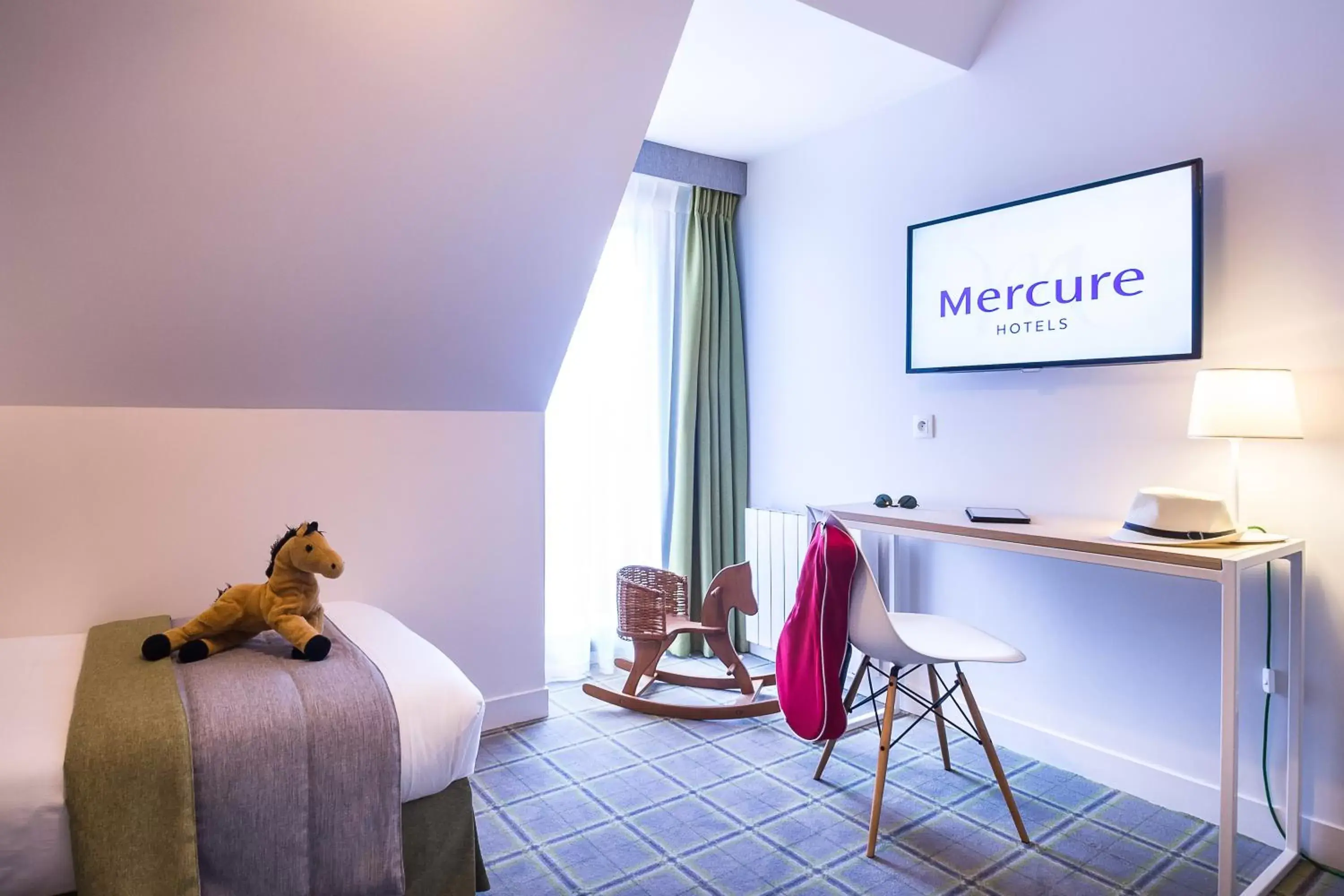 Bedroom in Mercure Deauville Centre