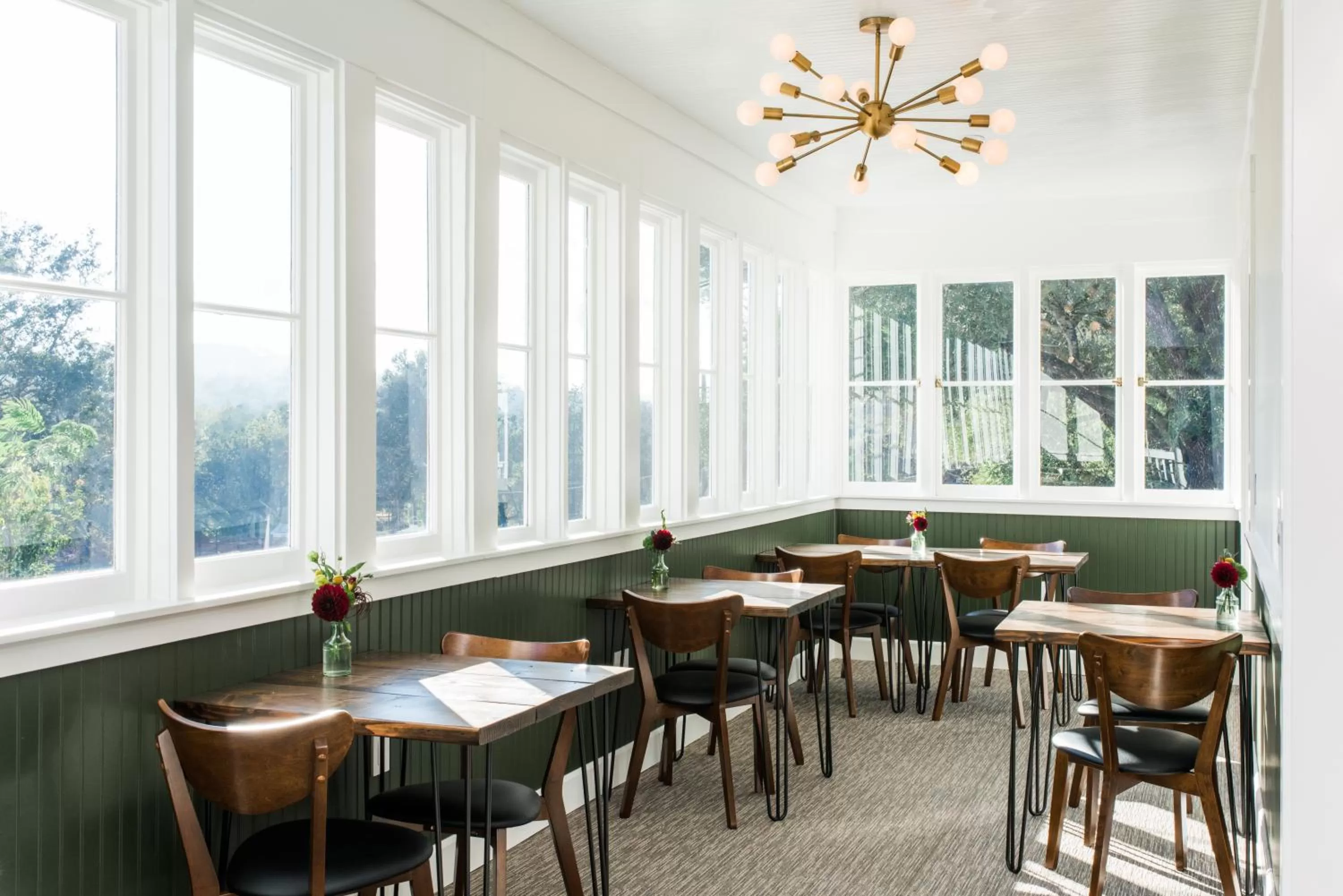 Communal lounge/ TV room in Olea Hotel