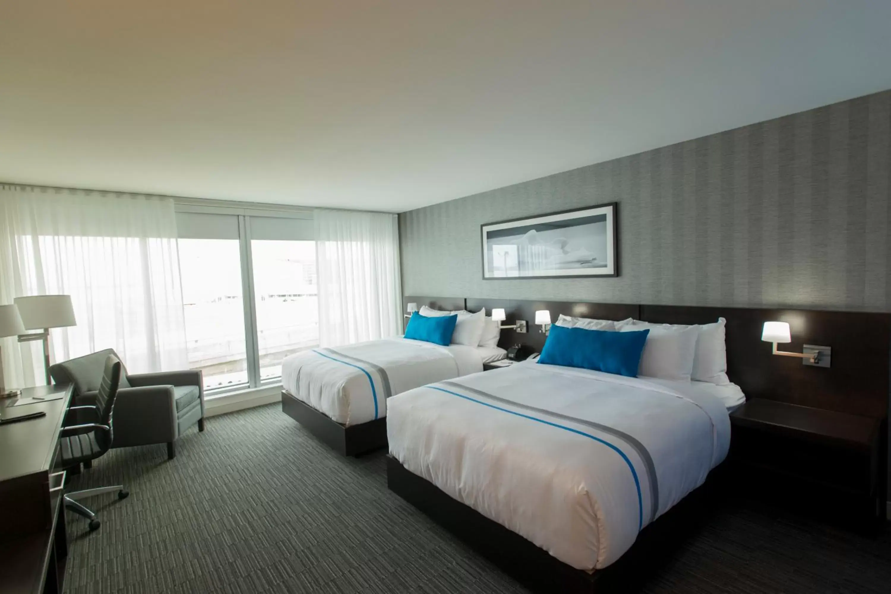 Bed in The Grand Winnipeg Airport Hotel by Lakeview