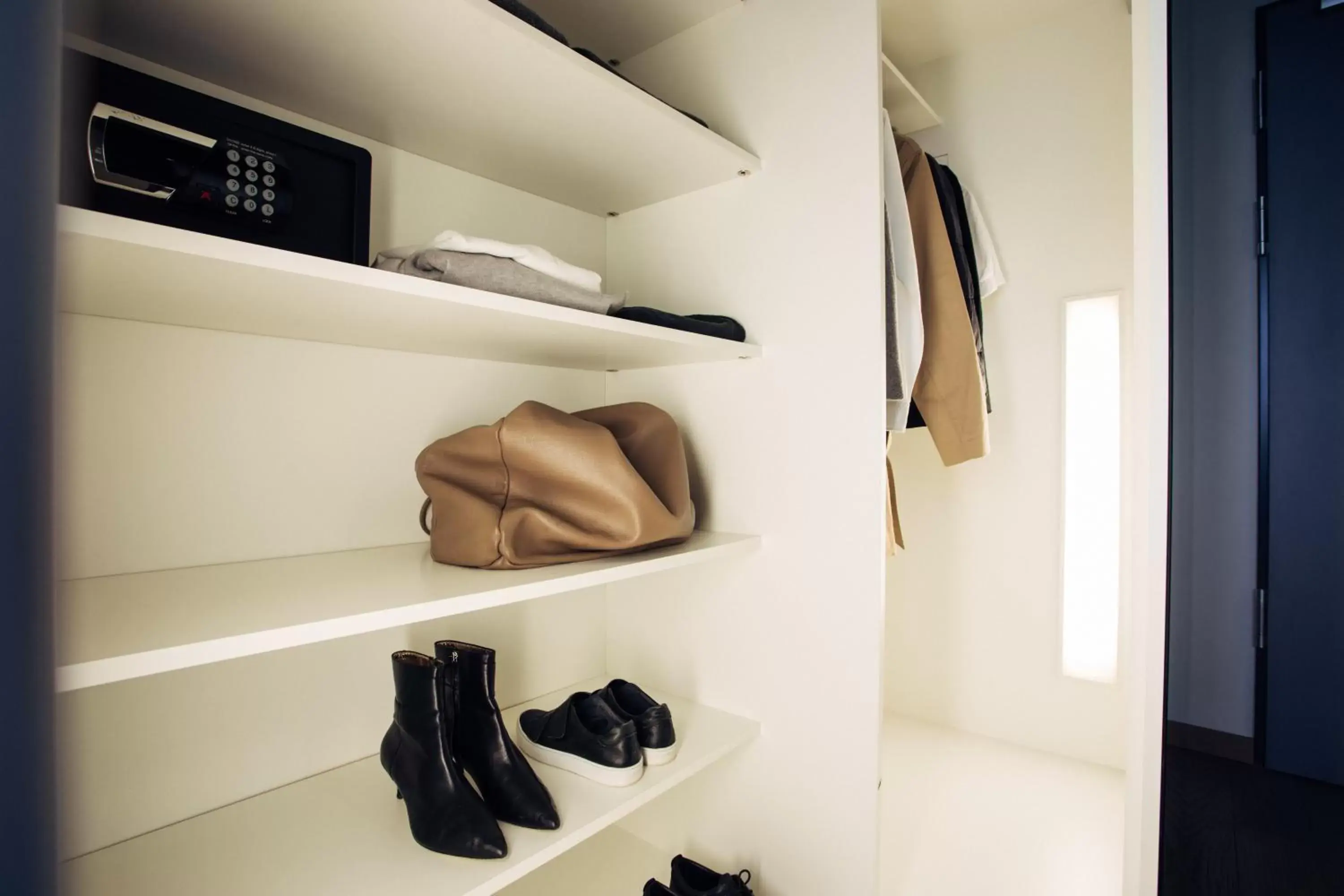 wardrobe, TV/Entertainment Center in harry's home hotel & apartments