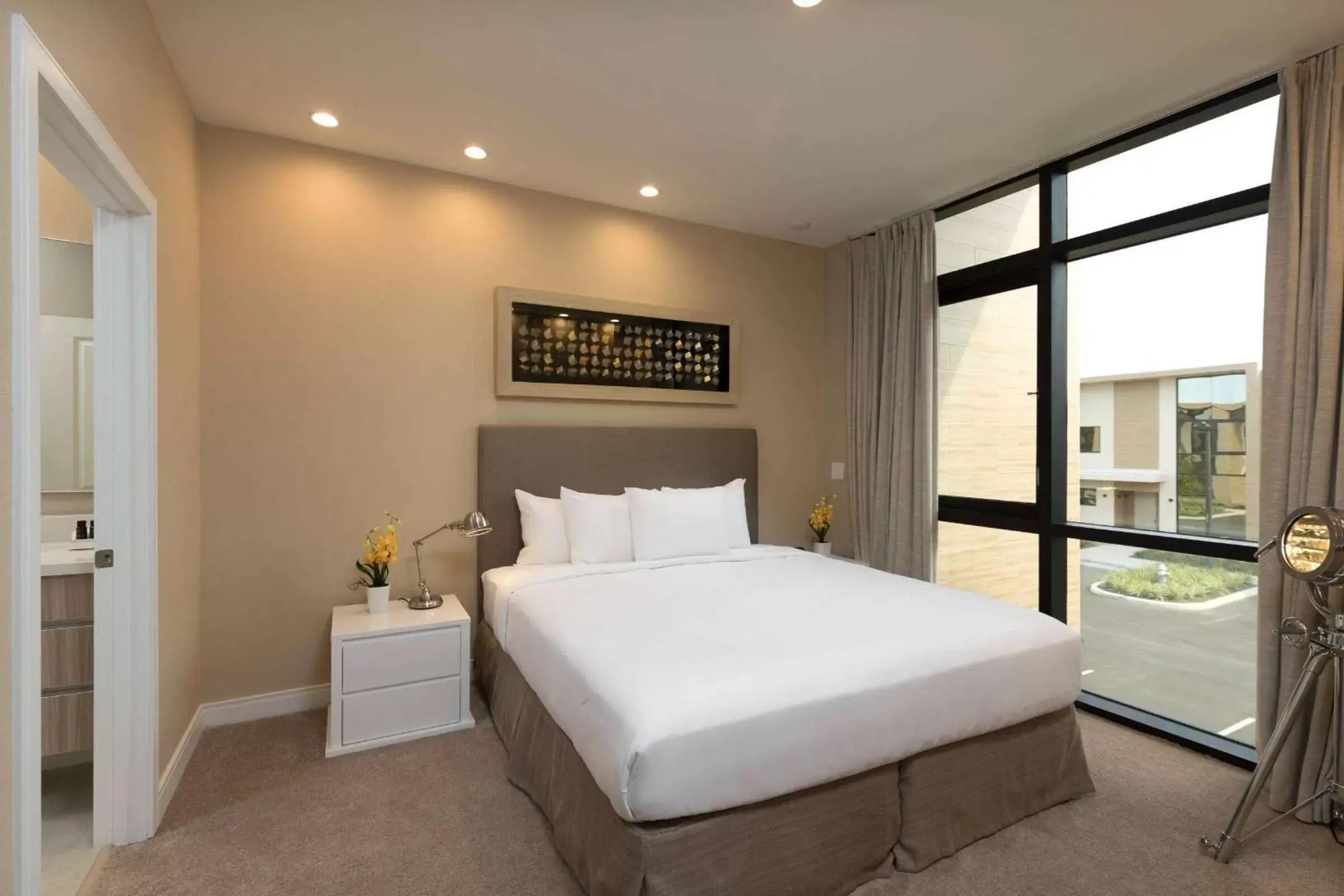 Photo of the whole room, Bed in Magic Village Views Trademark Collection by Wyndham