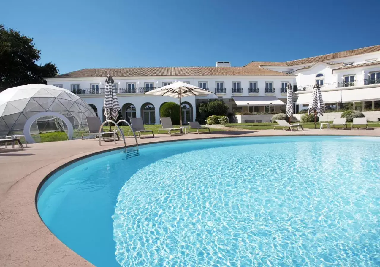 Property building, Swimming Pool in Montebelo Principe Perfeito Viseu Garden Hotel