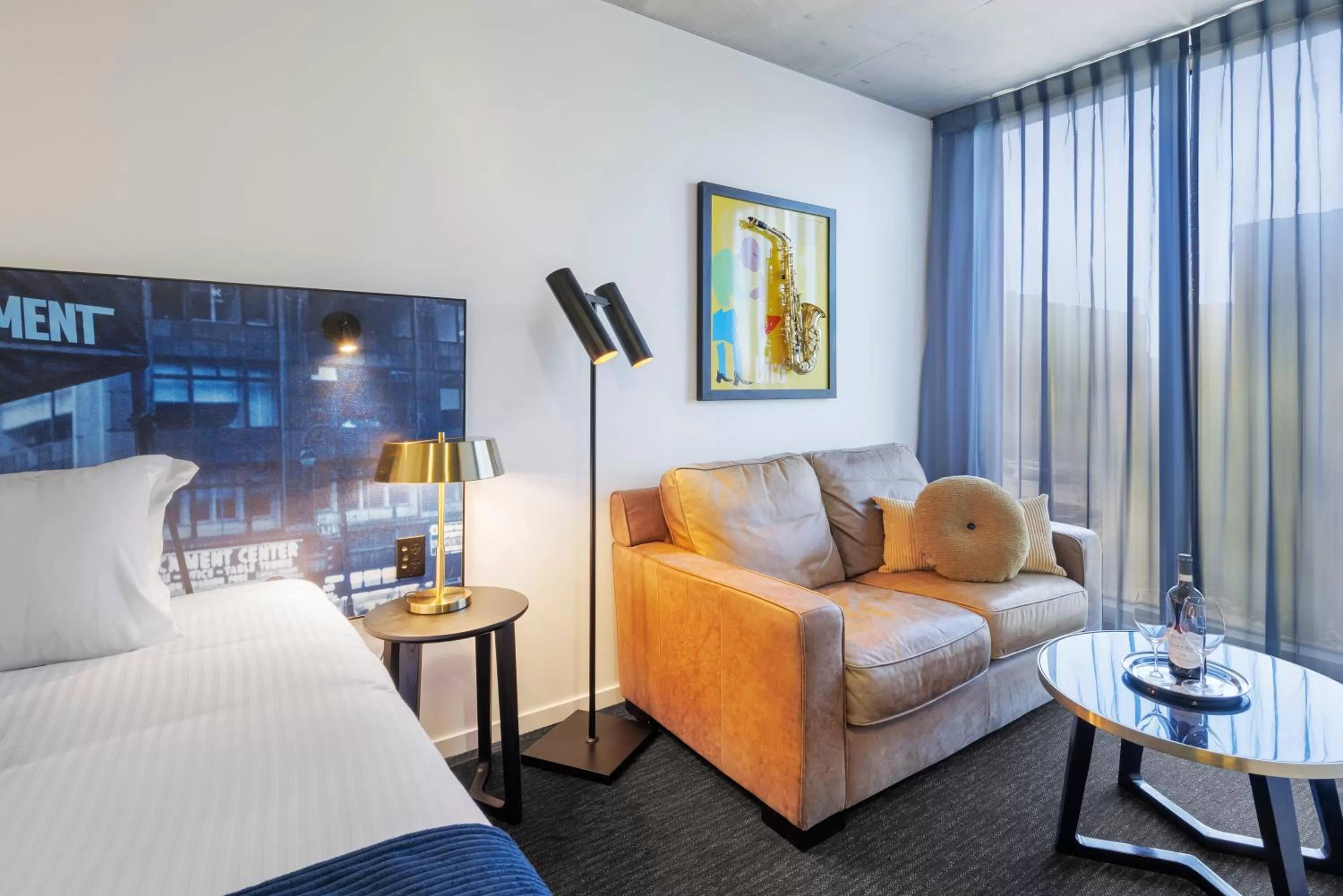 Bed, Seating Area in Mercure Melbourne St Kilda Road