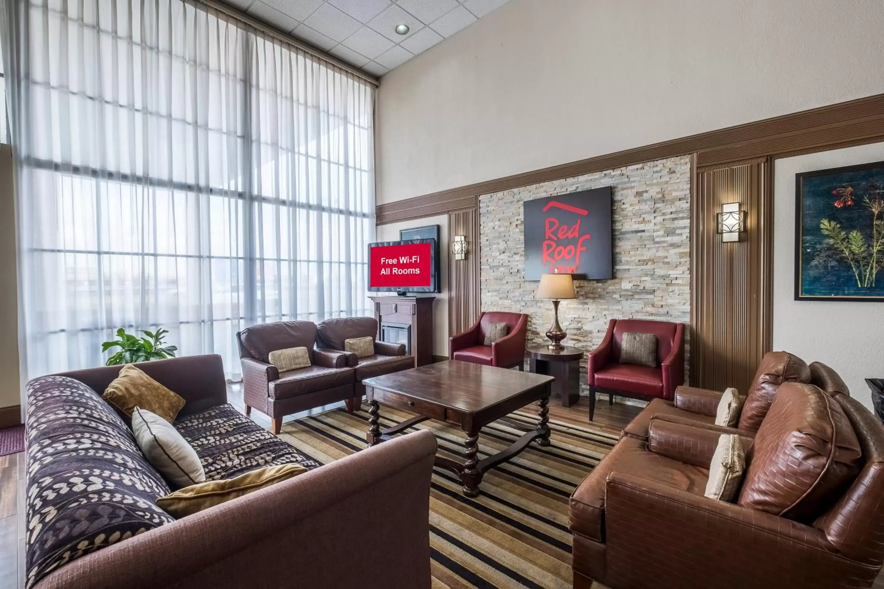 Lobby or reception, Lounge/Bar in Red Roof Inn Meridian