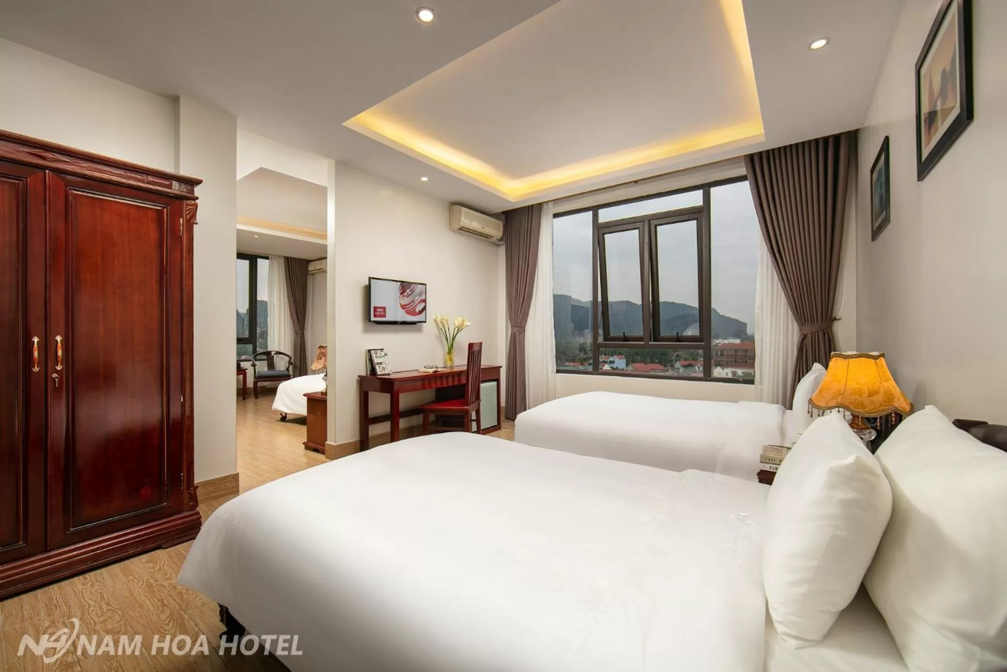 Photo of the whole room, Bed in Nam Hoa Hotel