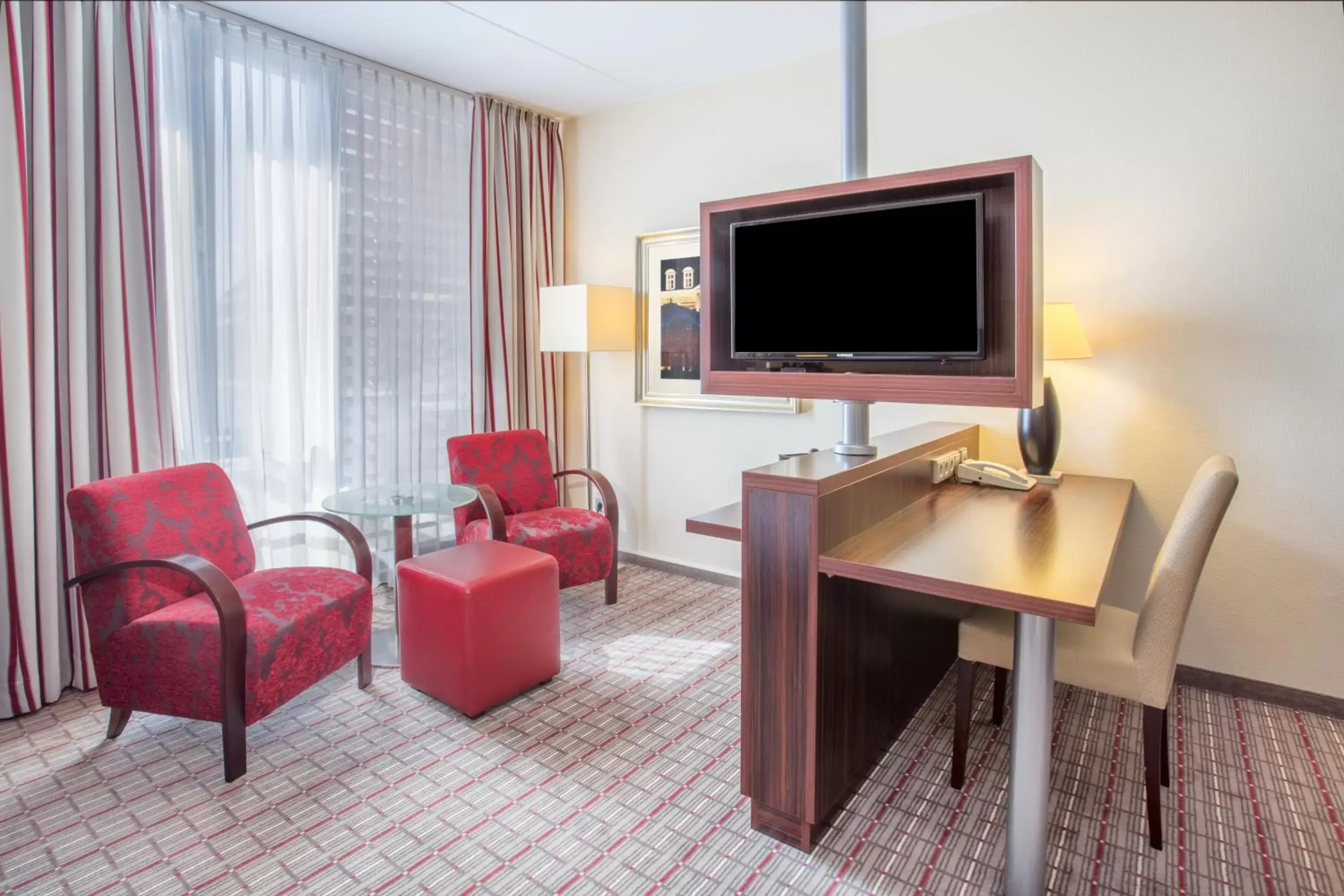 Photo of the whole room, TV/Entertainment Center in Crowne Plaza Maastricht, an IHG Hotel