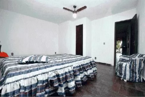 Bed in Pousada A Marca do Faraó