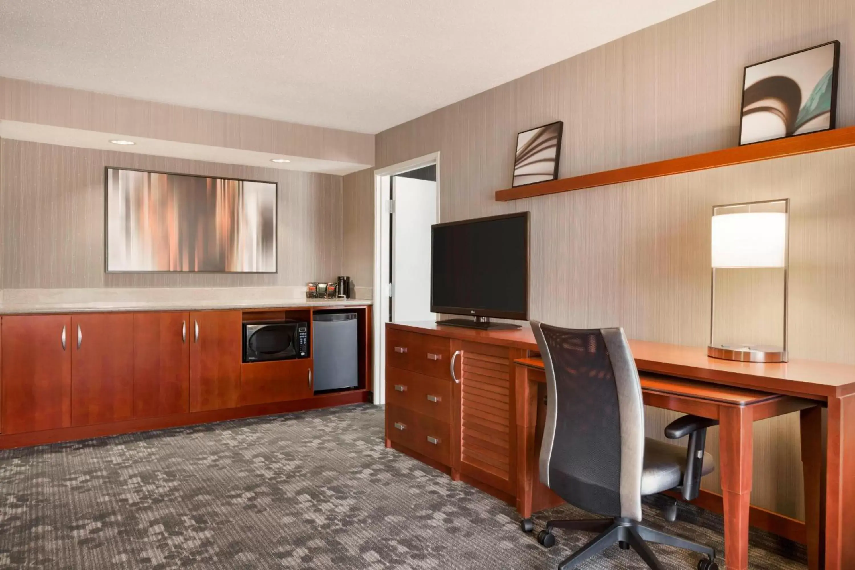 Photo of the whole room, TV/Entertainment Center in Courtyard by Marriott Bloomington Normal