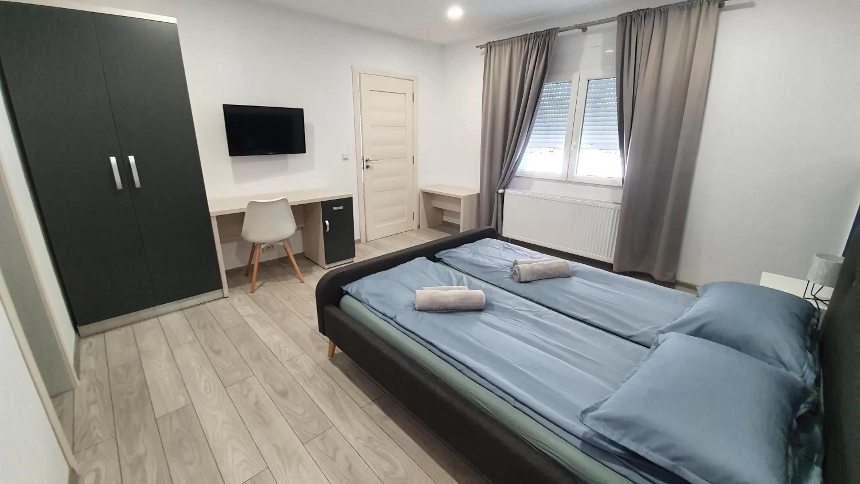 Photo of the whole room, Bed in Marcos Apartments Victoriei - self check-in