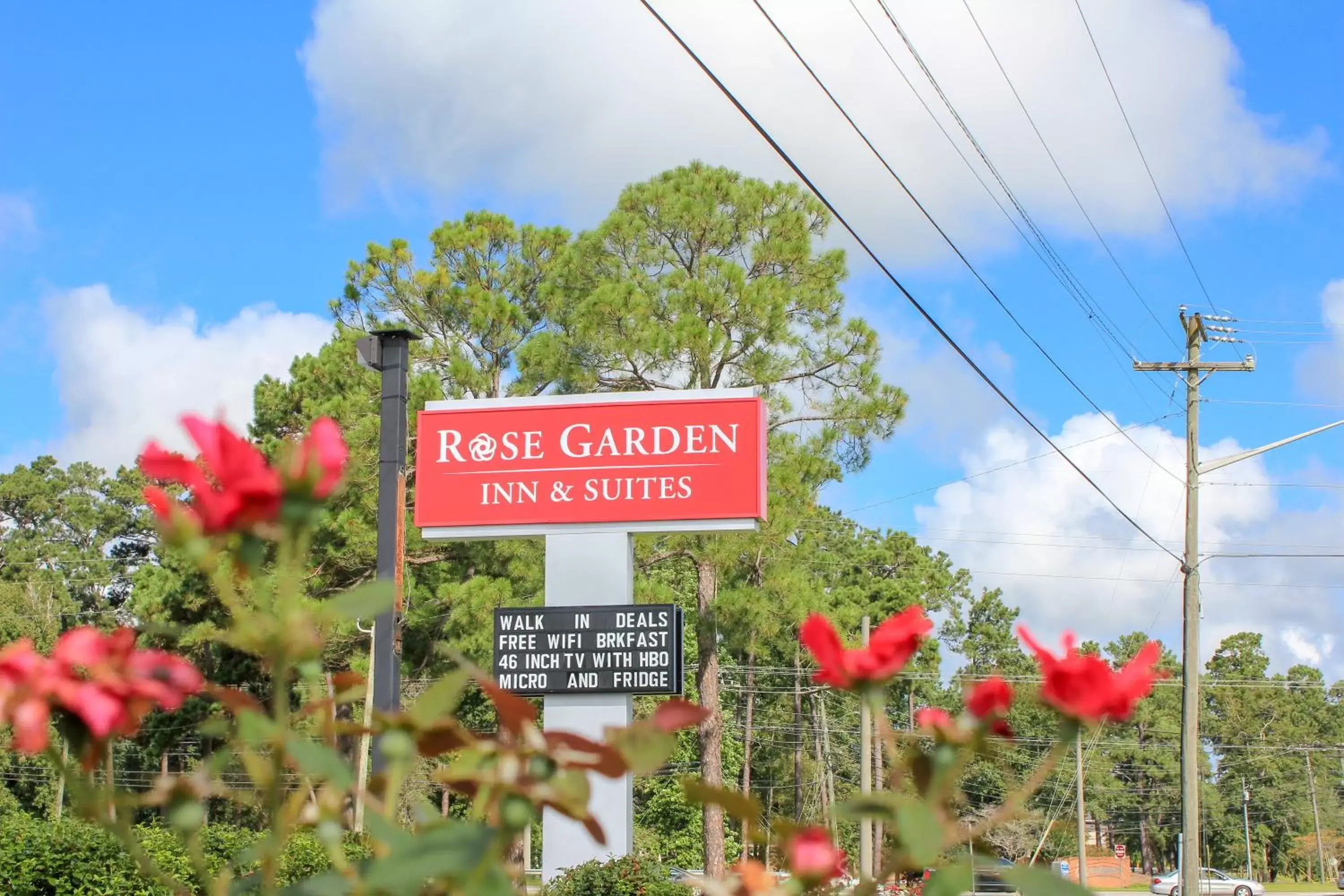 Property logo or sign in Rose Garden Inn & Suites Thomasville