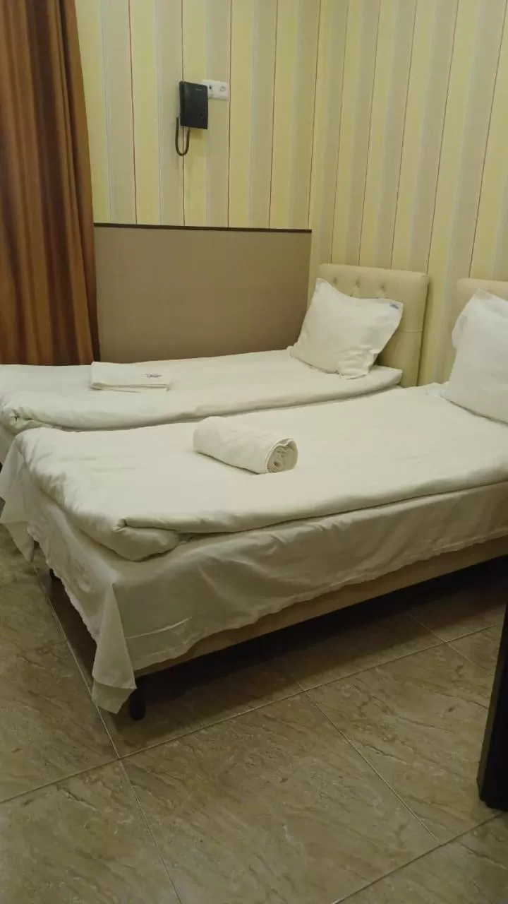 Bed in Eridana Hotel