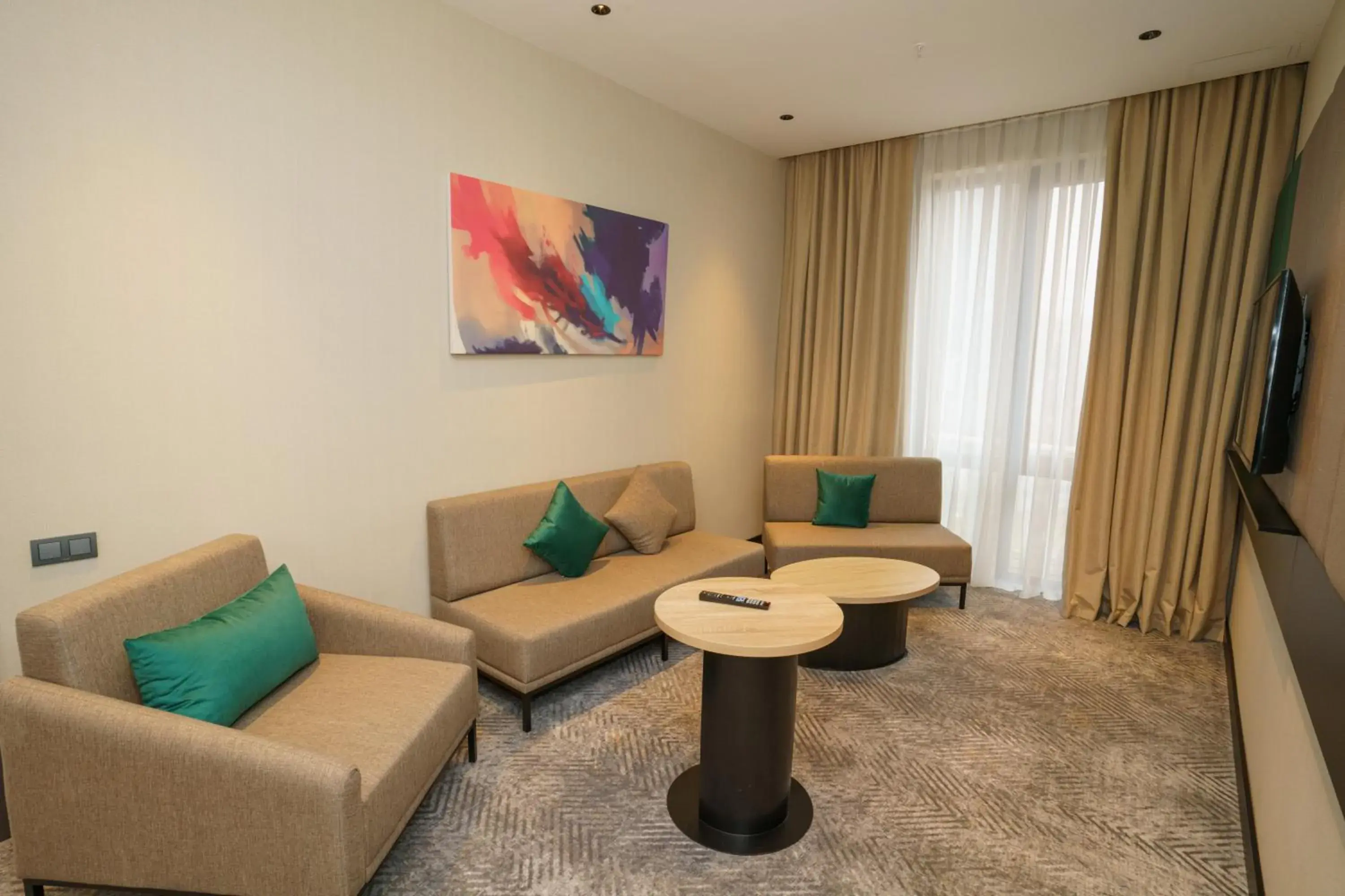 Living room, Seating Area in Holiday Inn Tashkent City, an IHG Hotel