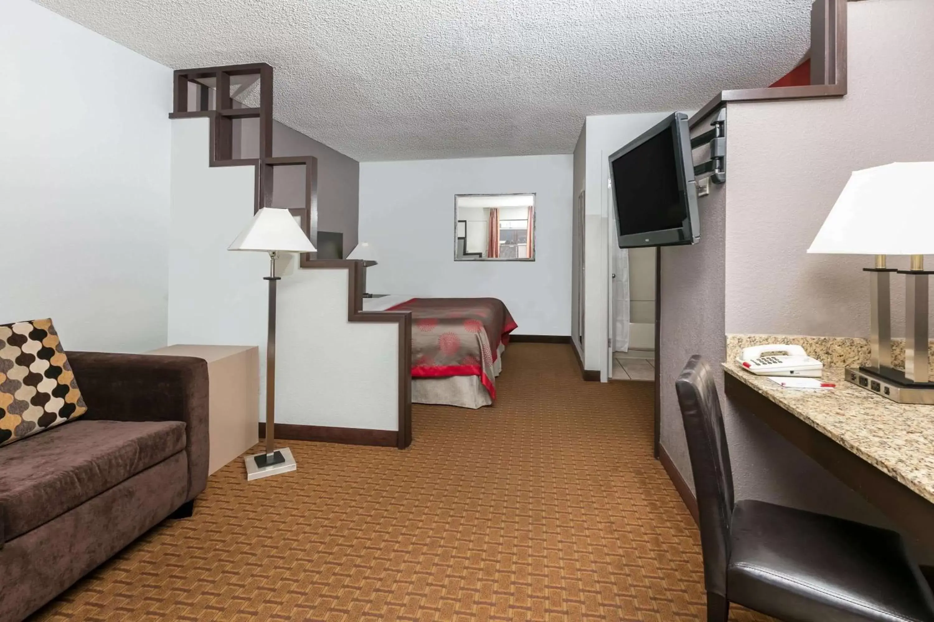 Photo of the whole room, TV/Entertainment Center in Ramada by Wyndham El Paso