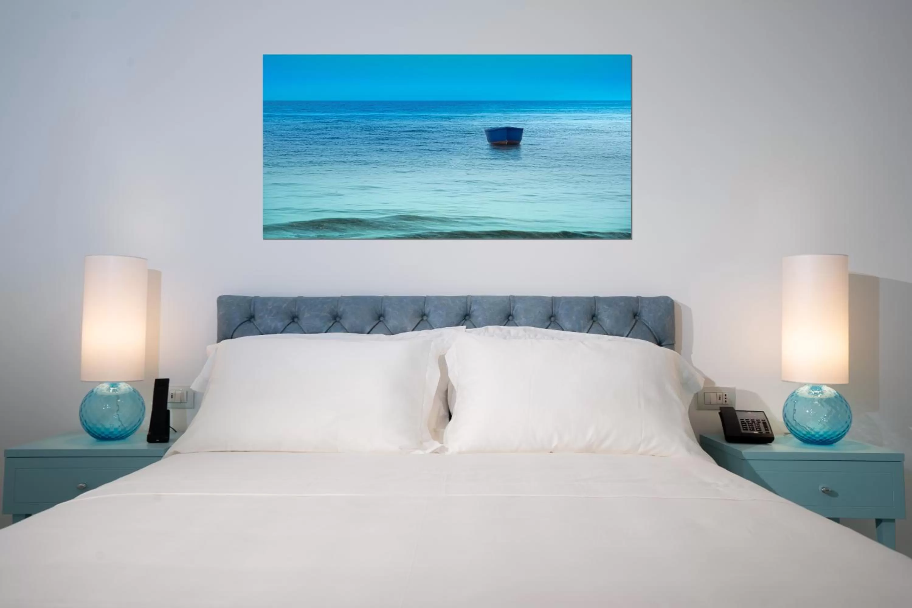 Bed in Grotta Palazzese Beach Hotel