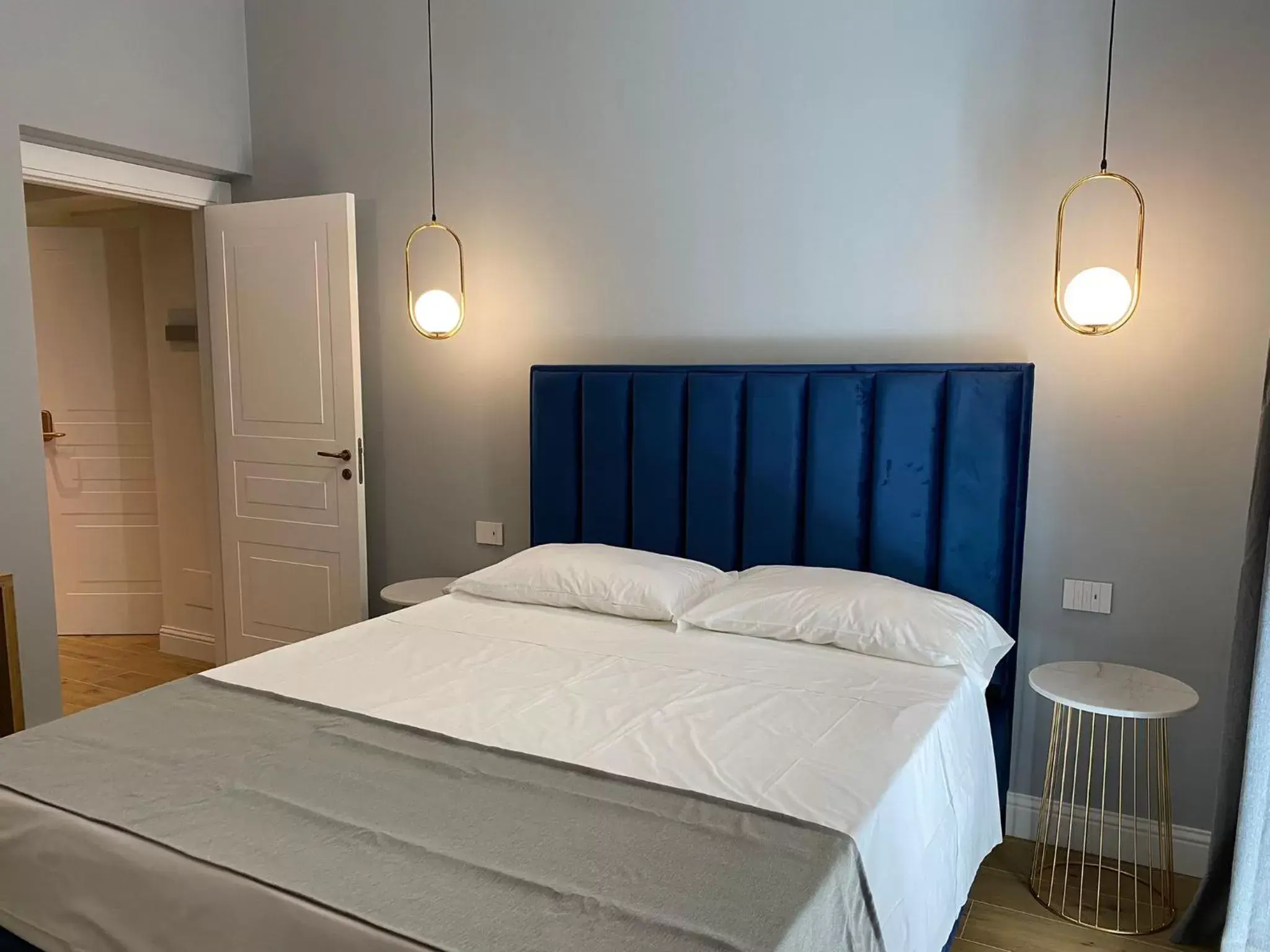 Bed in Krysos Luxury Rooms