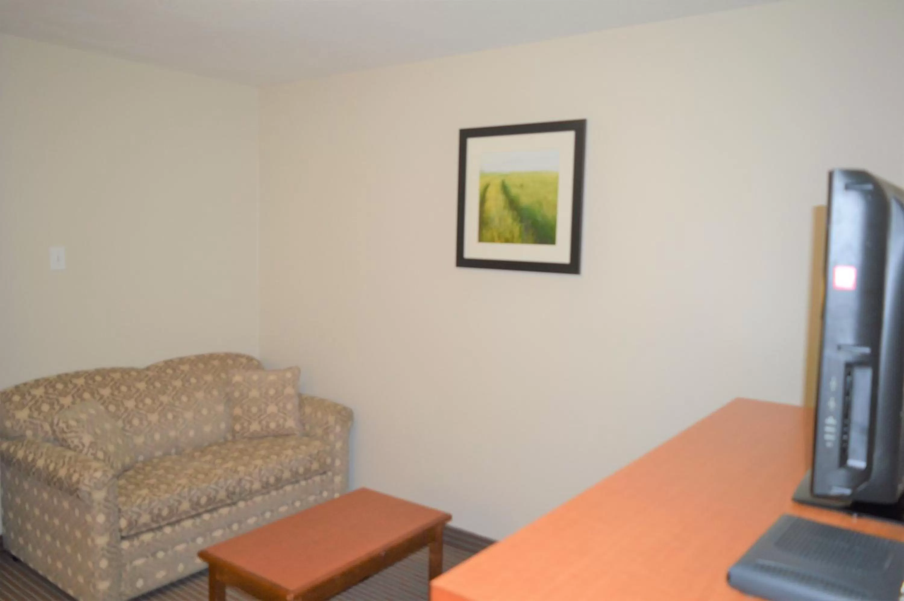 Living room in Super 8 by Wyndham Grande Prairie