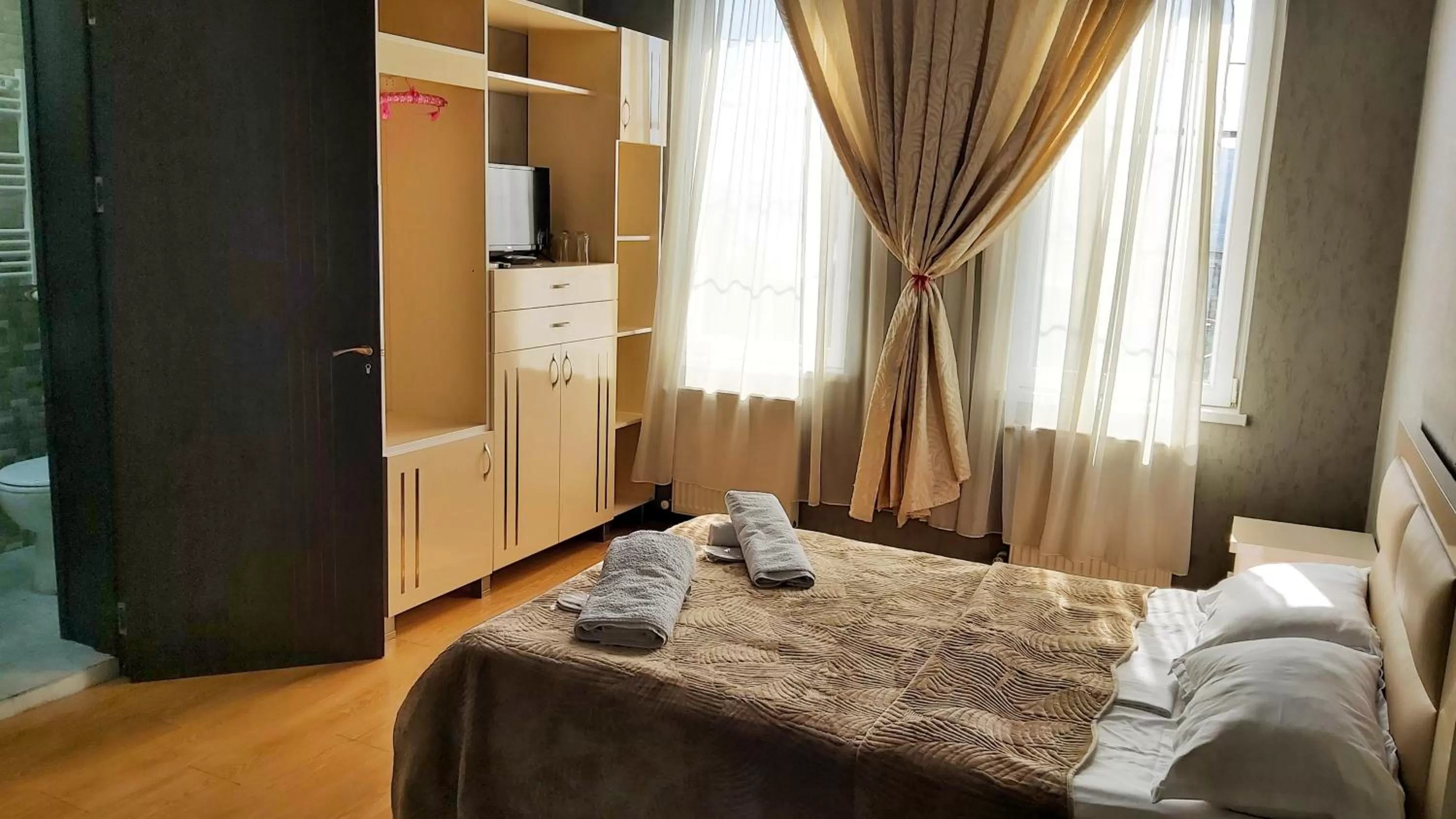 Photo of the whole room, Bed in Gamarjoba Hotel