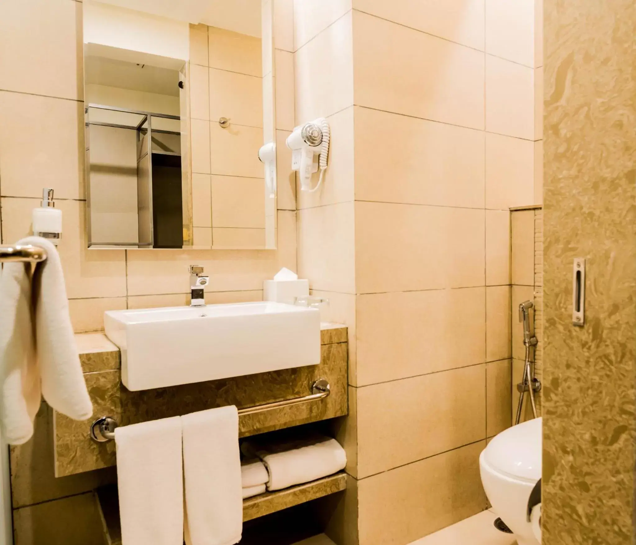 Bathroom in Holiday Inn Express Kolkata Airport, an IHG Hotel