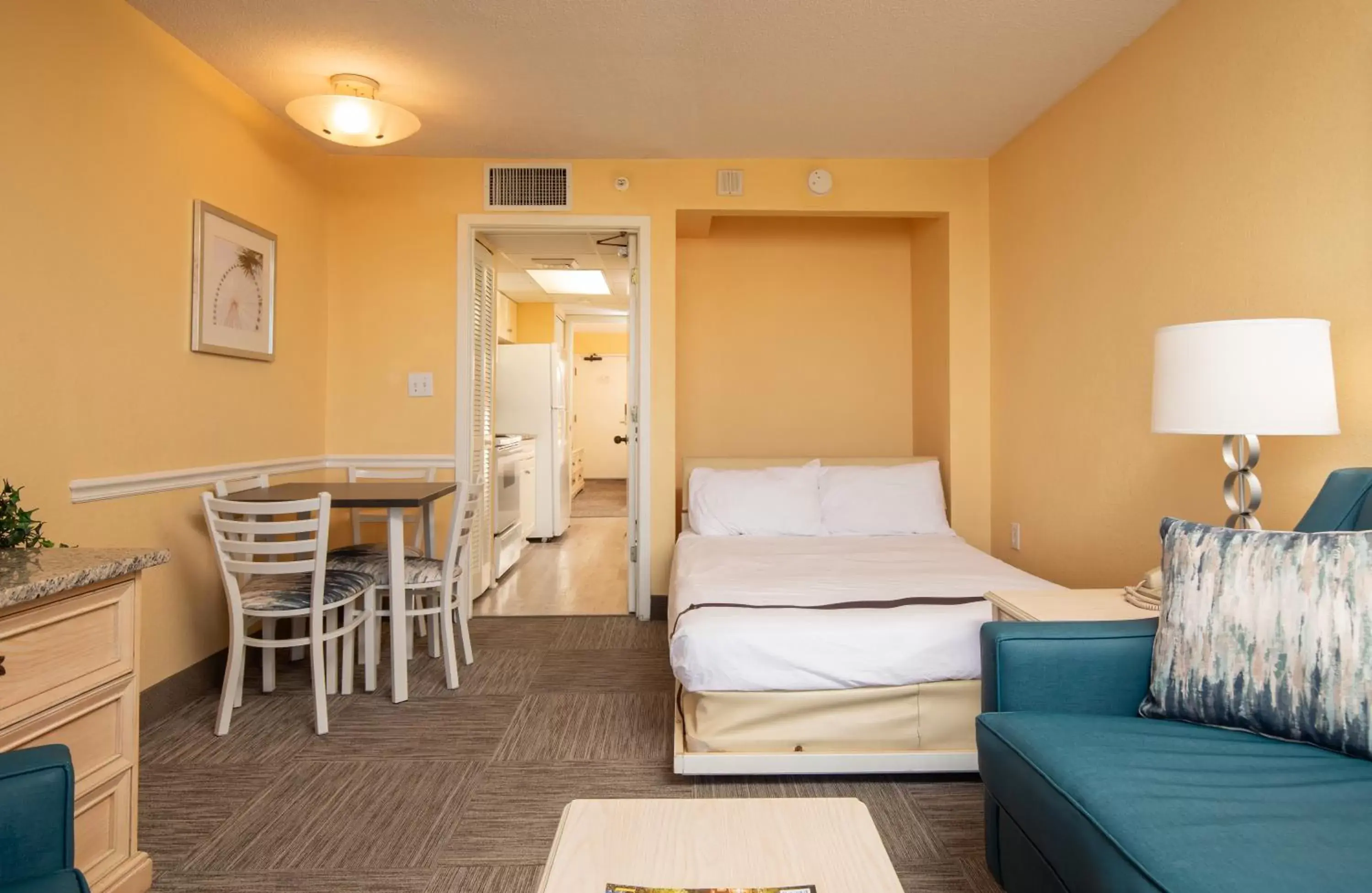 Bed, Seating Area in Grande Shores Ocean Resorts Condominiums