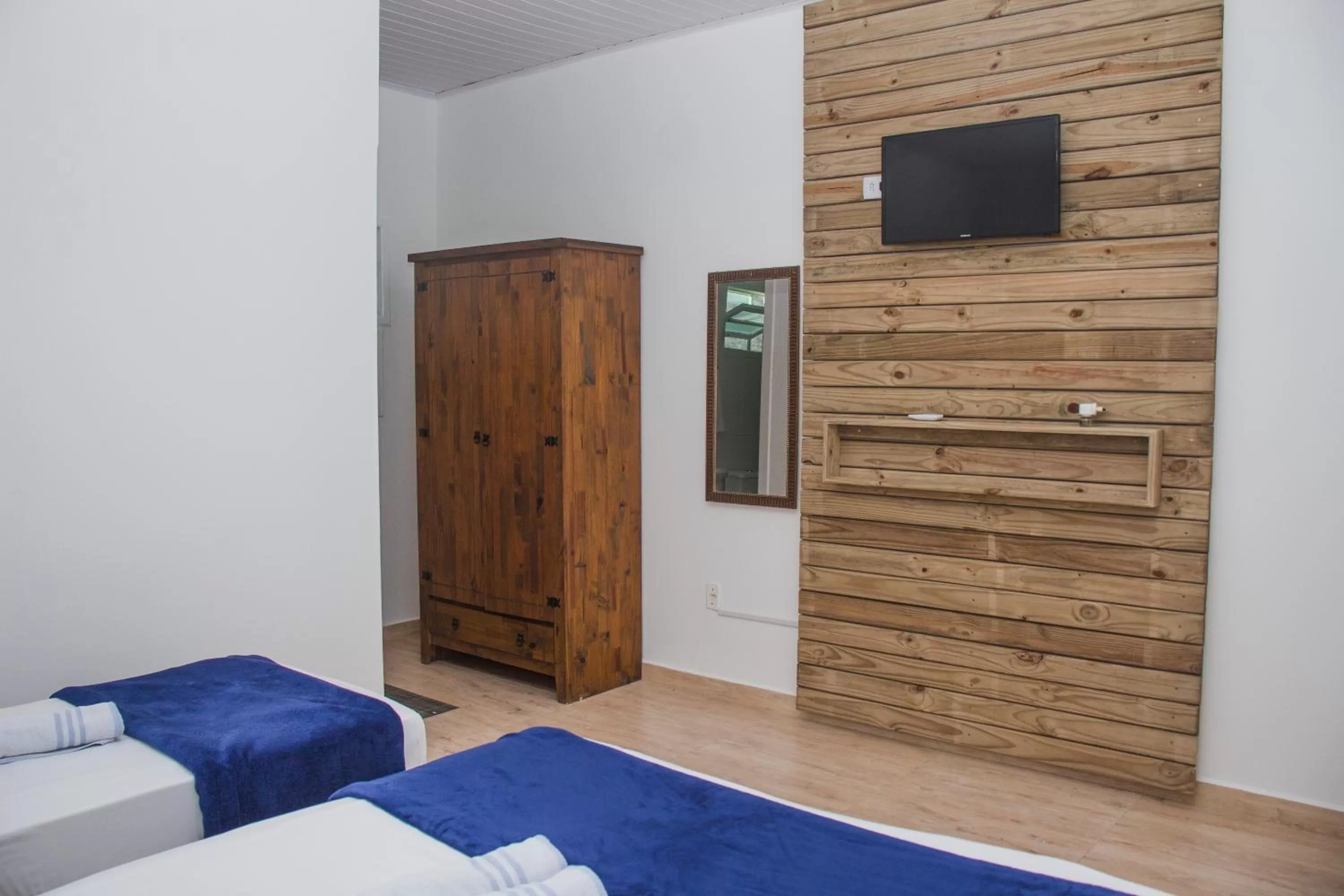 Bed in Pousada Marinamarela