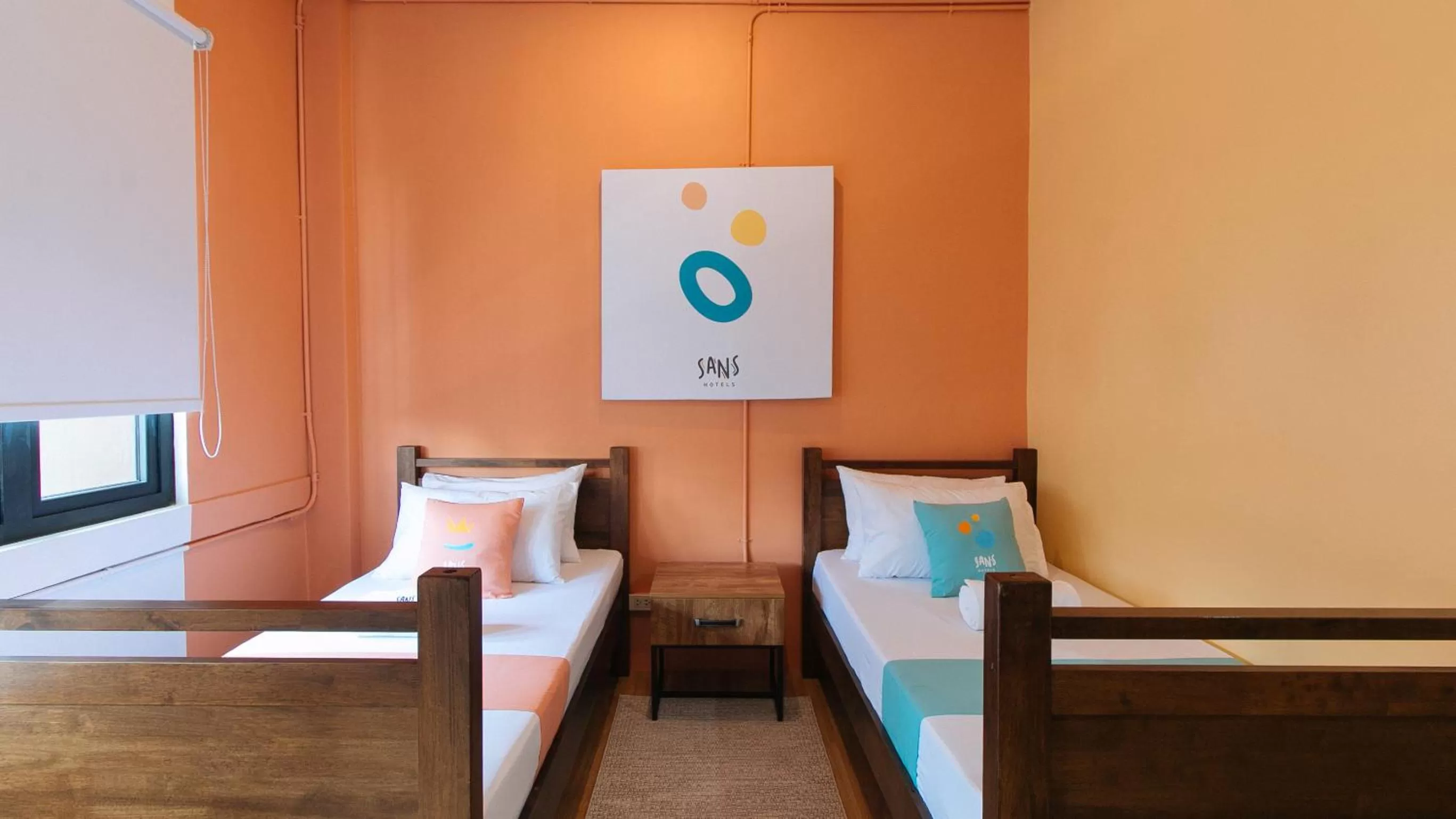 Bed in Sans Hotel Laperal Manila