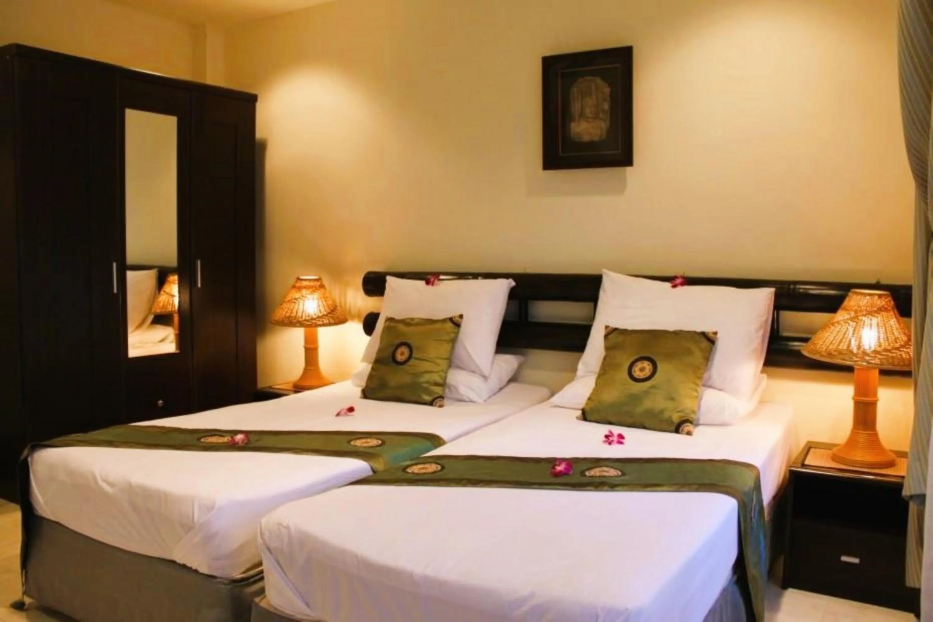 Bed in The Waterfront Hotel at Fisherman's Village