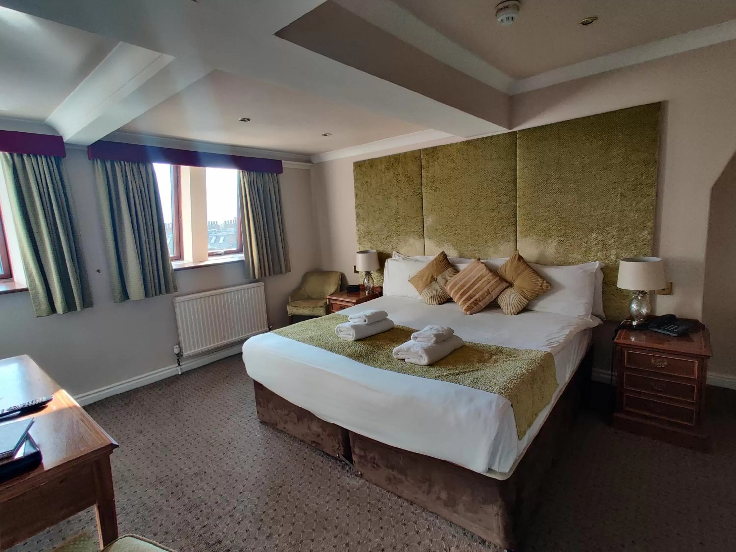 Bed in The Minster Hotel