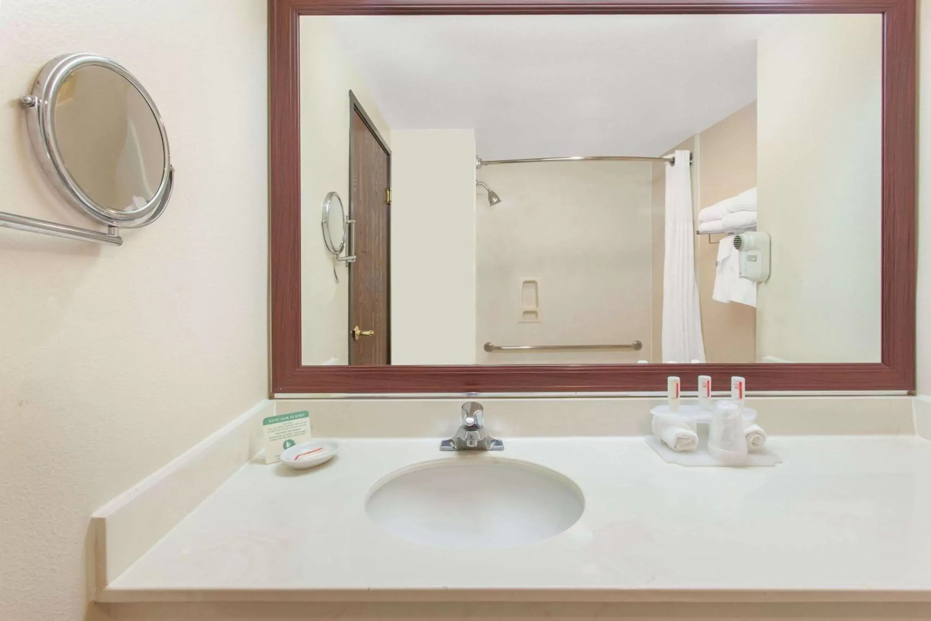 Bathroom in Ramada by Wyndham Fresno Northwest