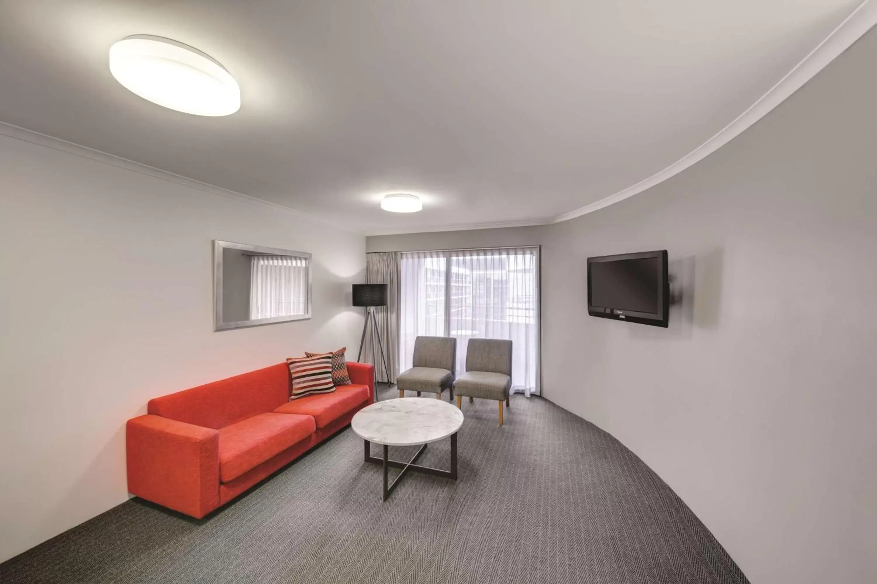 Living room, Seating Area in Adina Serviced Apartments Canberra James Court
