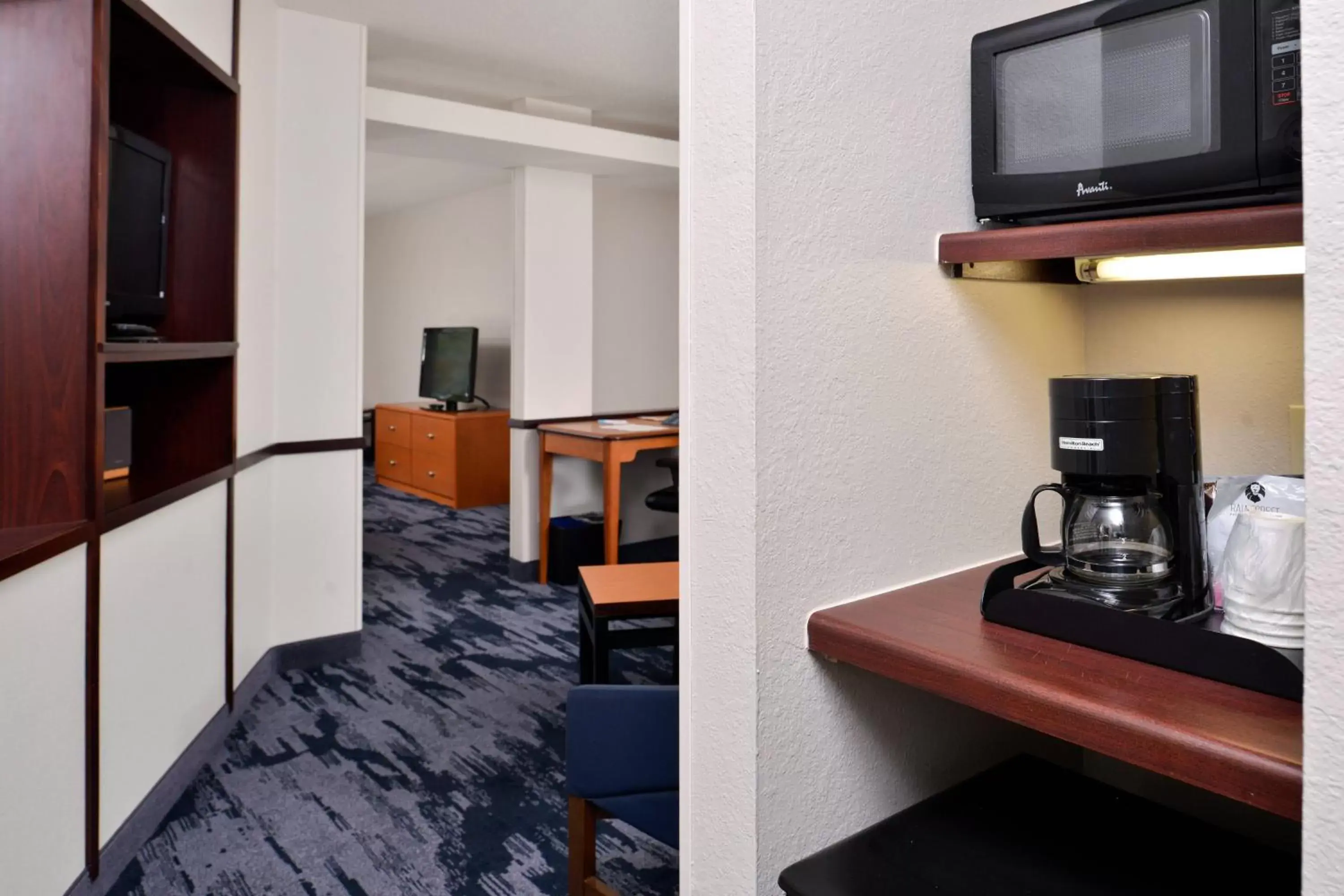 Photo of the whole room, TV/Entertainment Center in Fairfield Inn and Suites Beloit