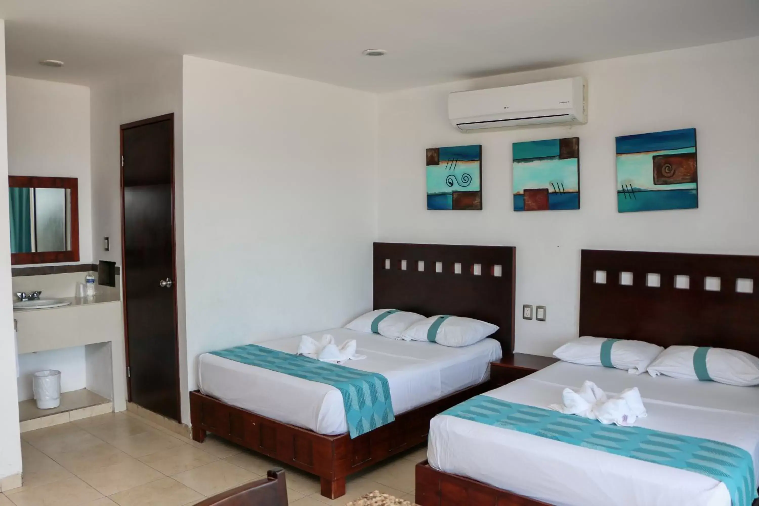 Bed in Playa Linda Hotel