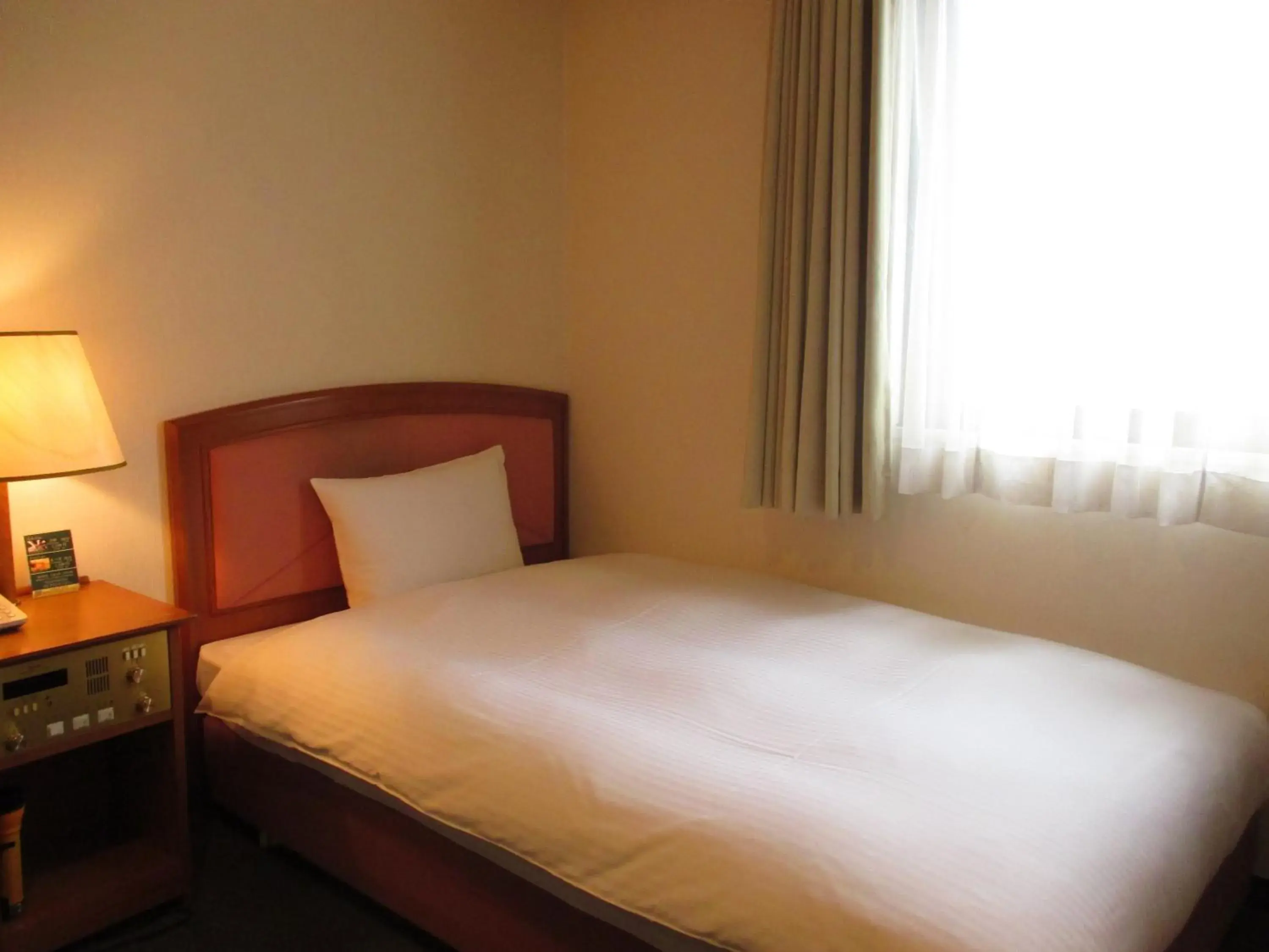 Photo of the whole room, Bed in Hotel Green Selec