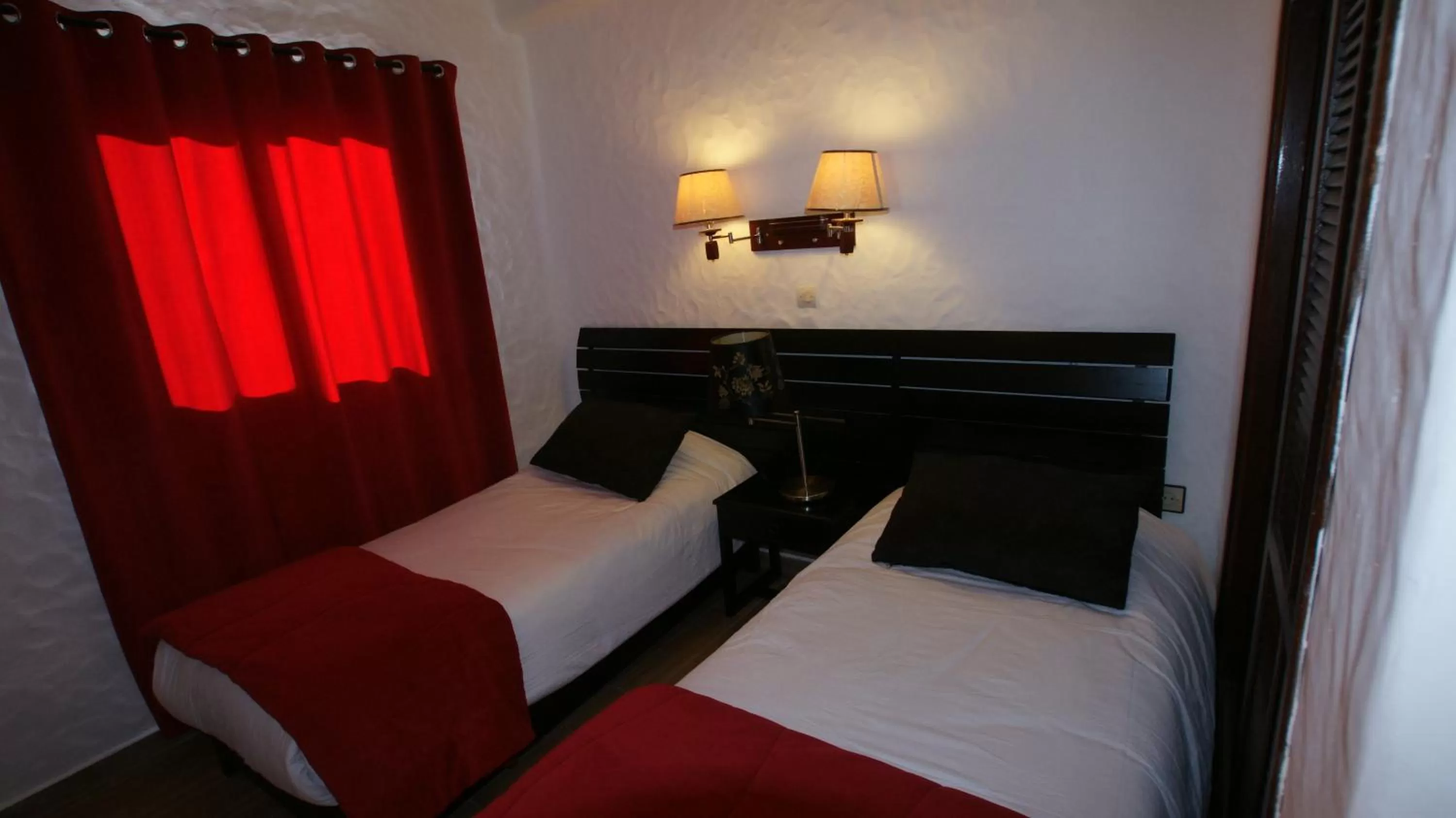 Bed in Hotel Hacienda