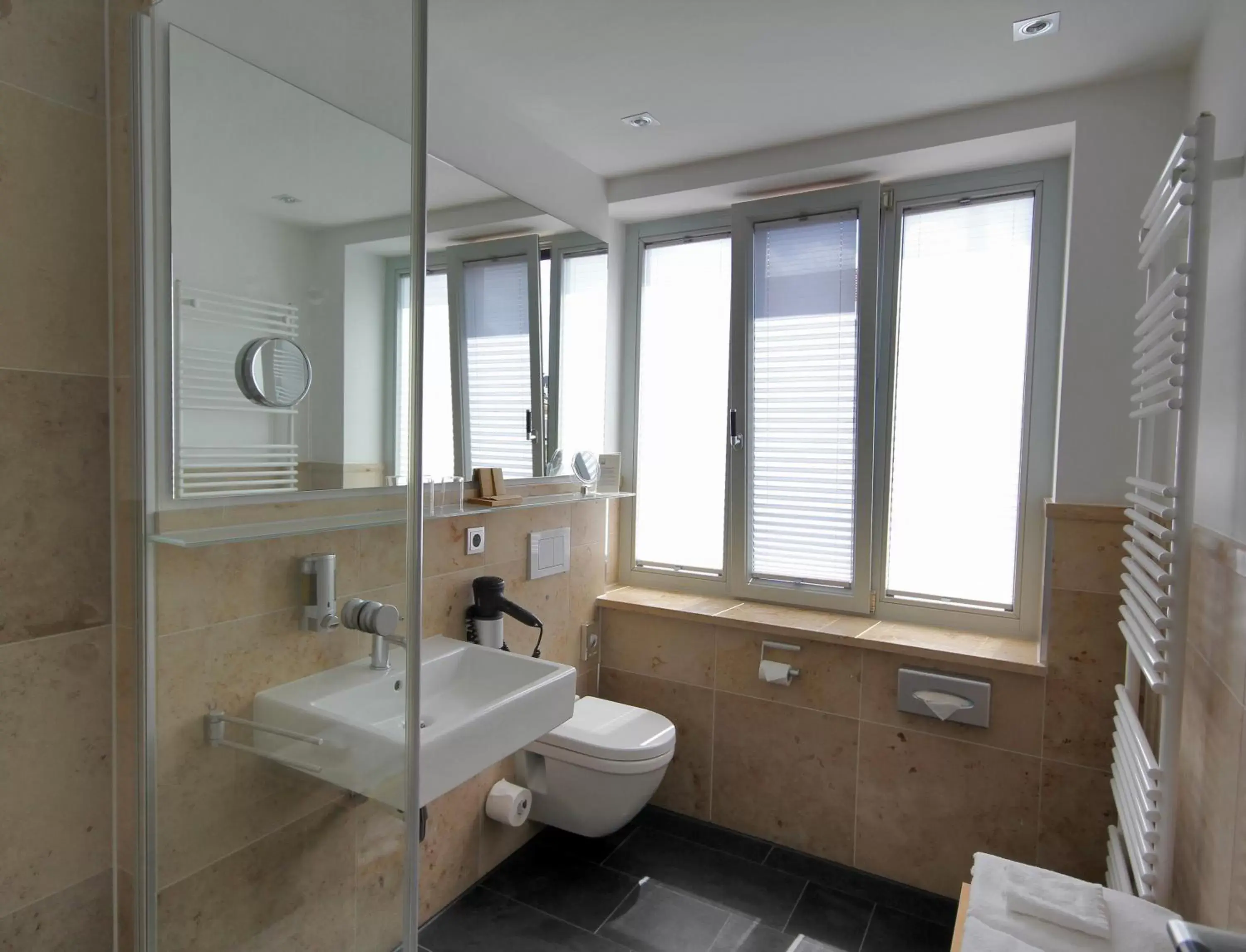 Bathroom in Qube Hotel Bergheim