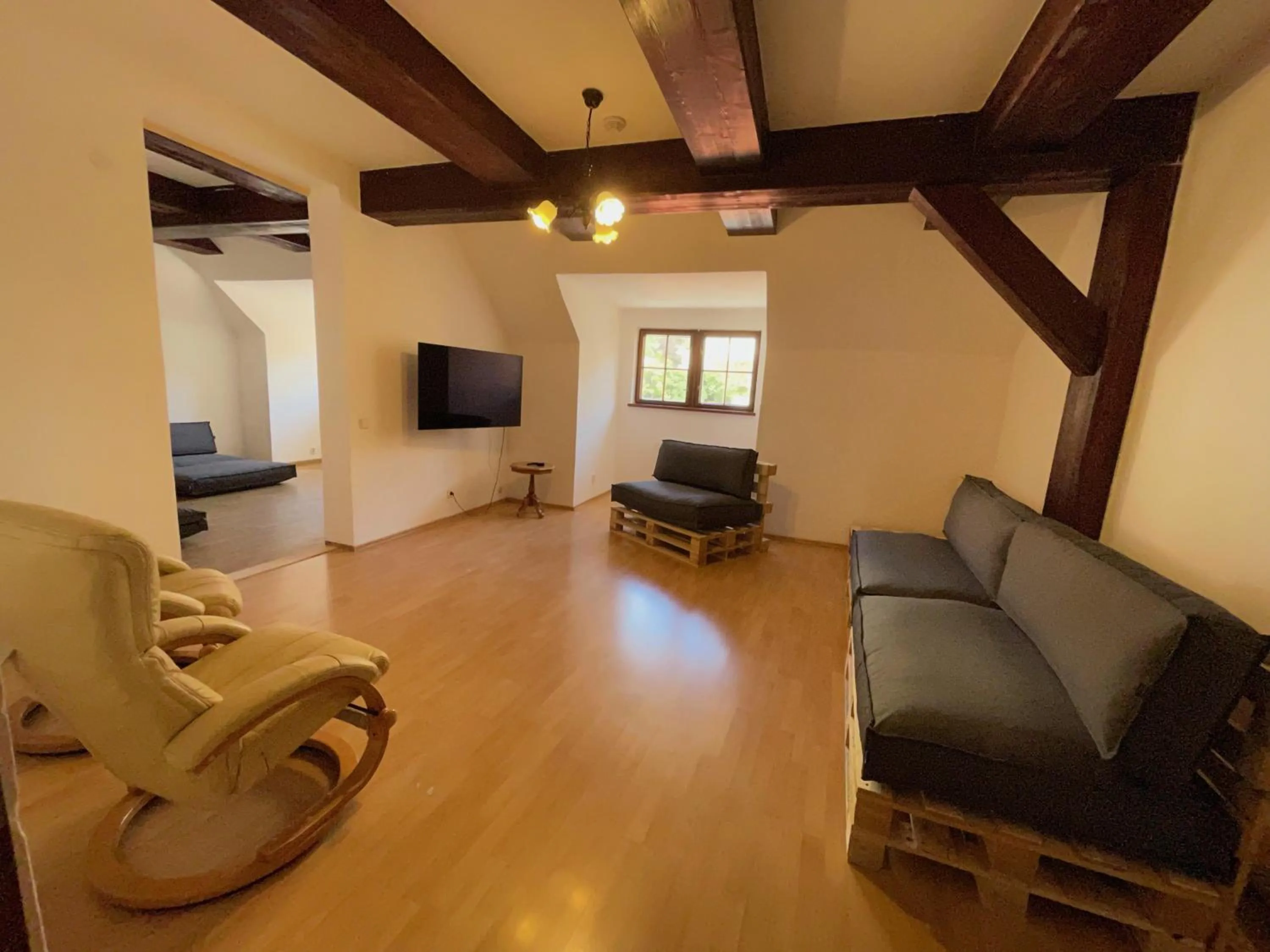 Communal lounge/ TV room in Hostel Little Quarter