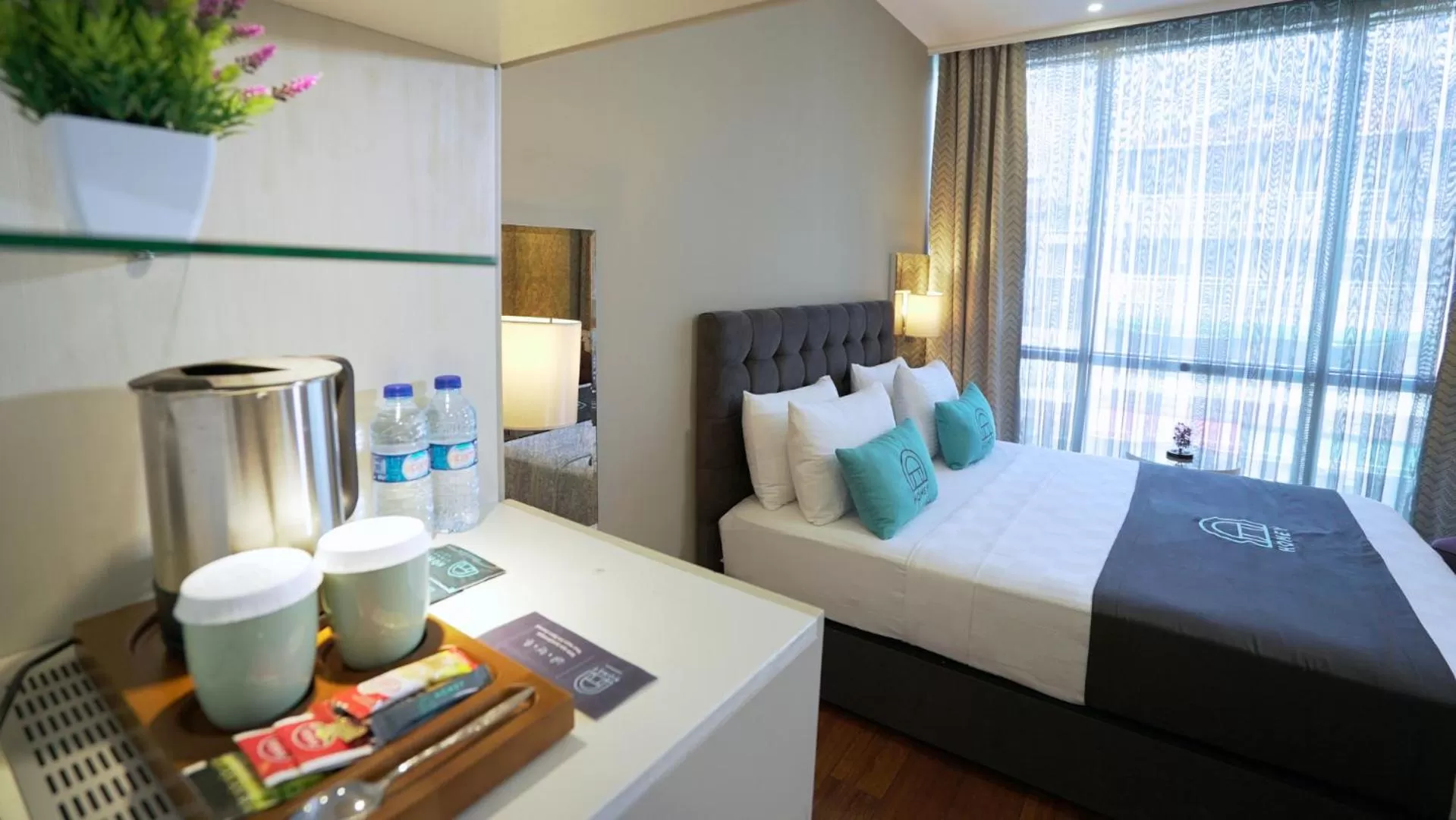 Bed in Homey AirPort Hotel