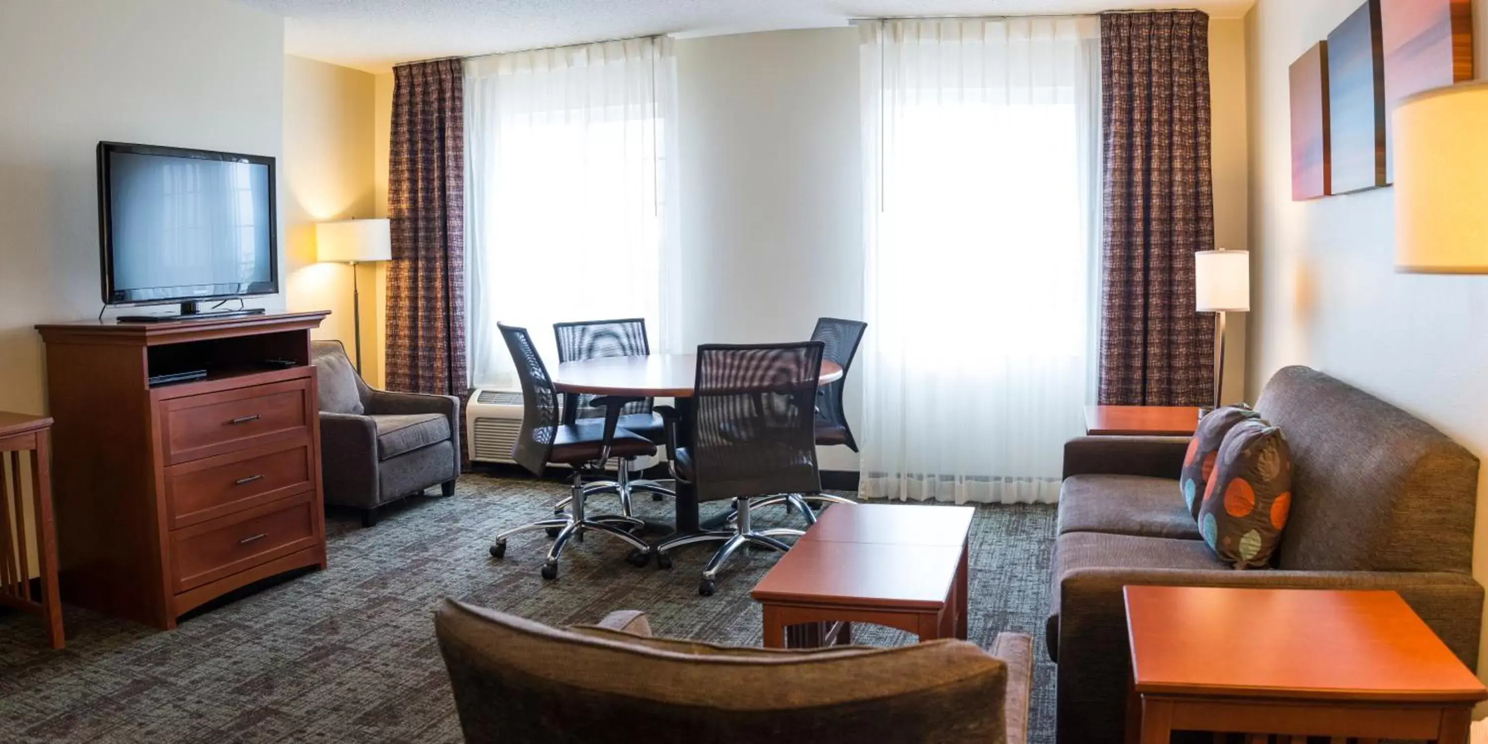 Photo of the whole room, TV/Entertainment Center in Staybridge Suites Fargo, an IHG Hotel