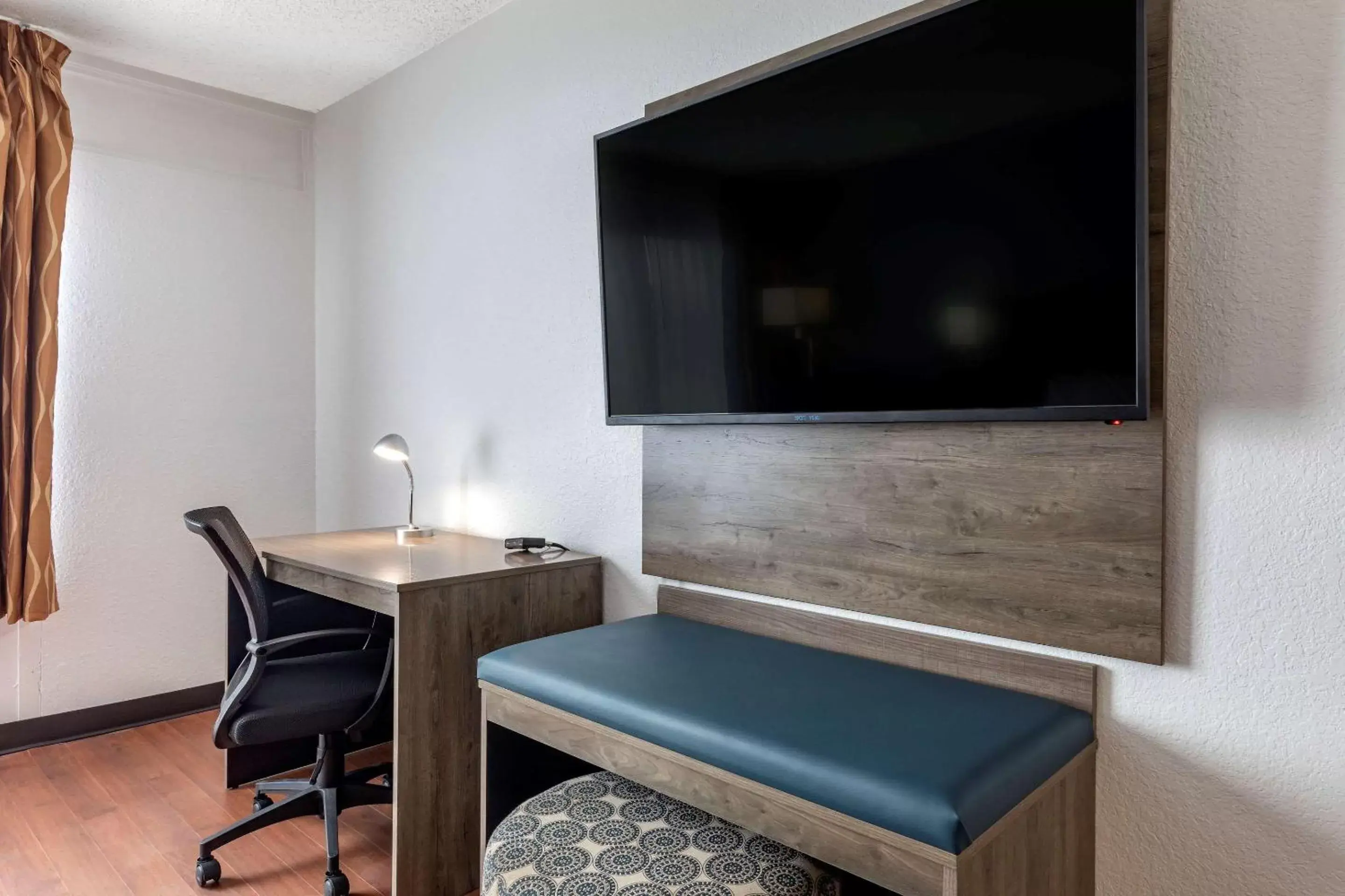 Photo of the whole room, TV/Entertainment Center in Quality Inn & Suites Sulphur Springs
