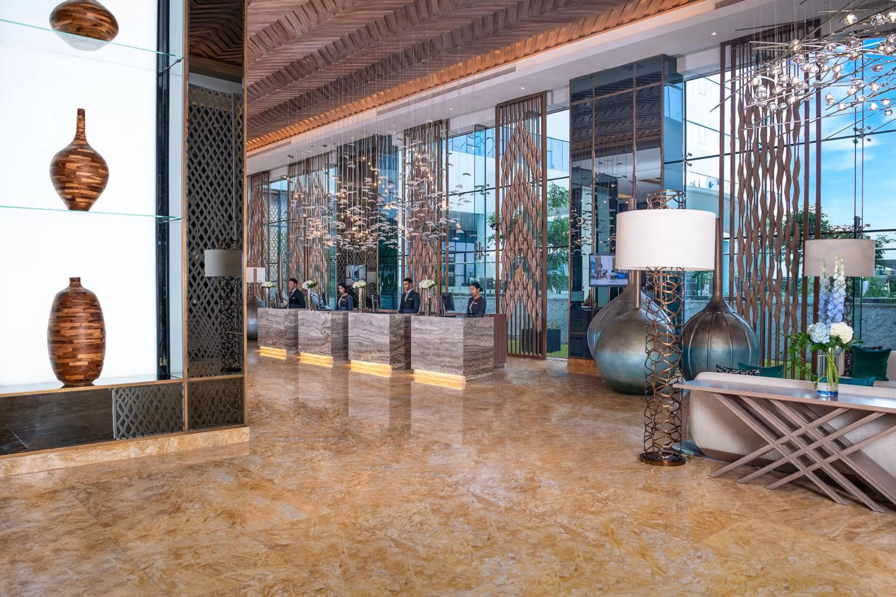 Lobby or reception in Al Jaddaf Rotana Suite Hotel
