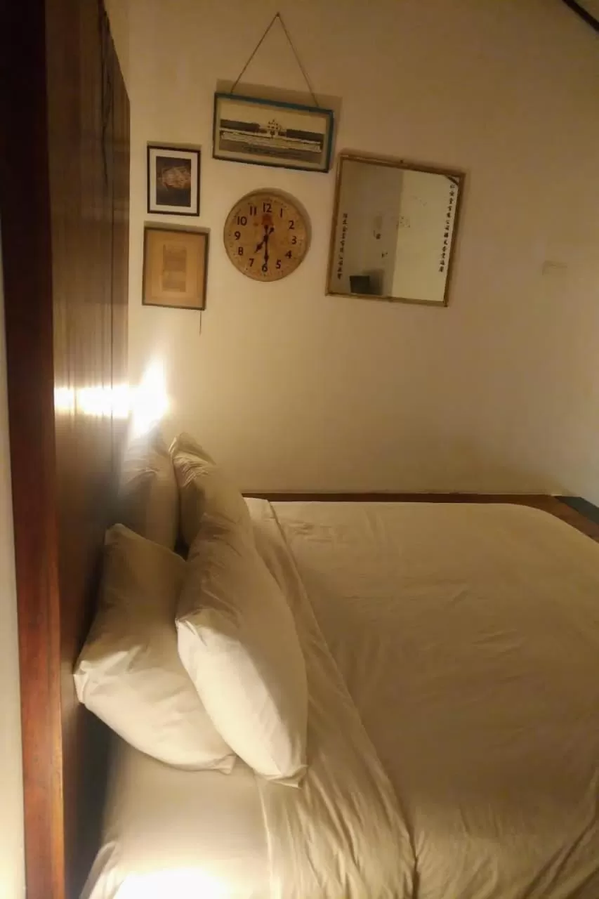 Bed in Ren I Tang Heritage Inn