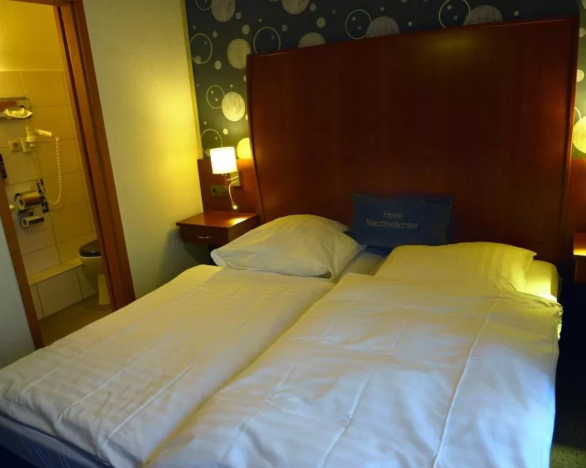 Bed in Hotel-Nachtwächter