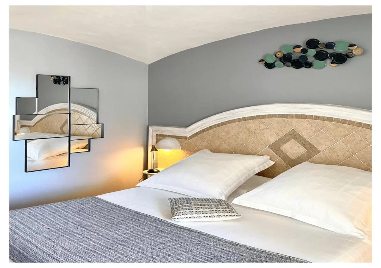 Bed in Ostella Spa & Resort