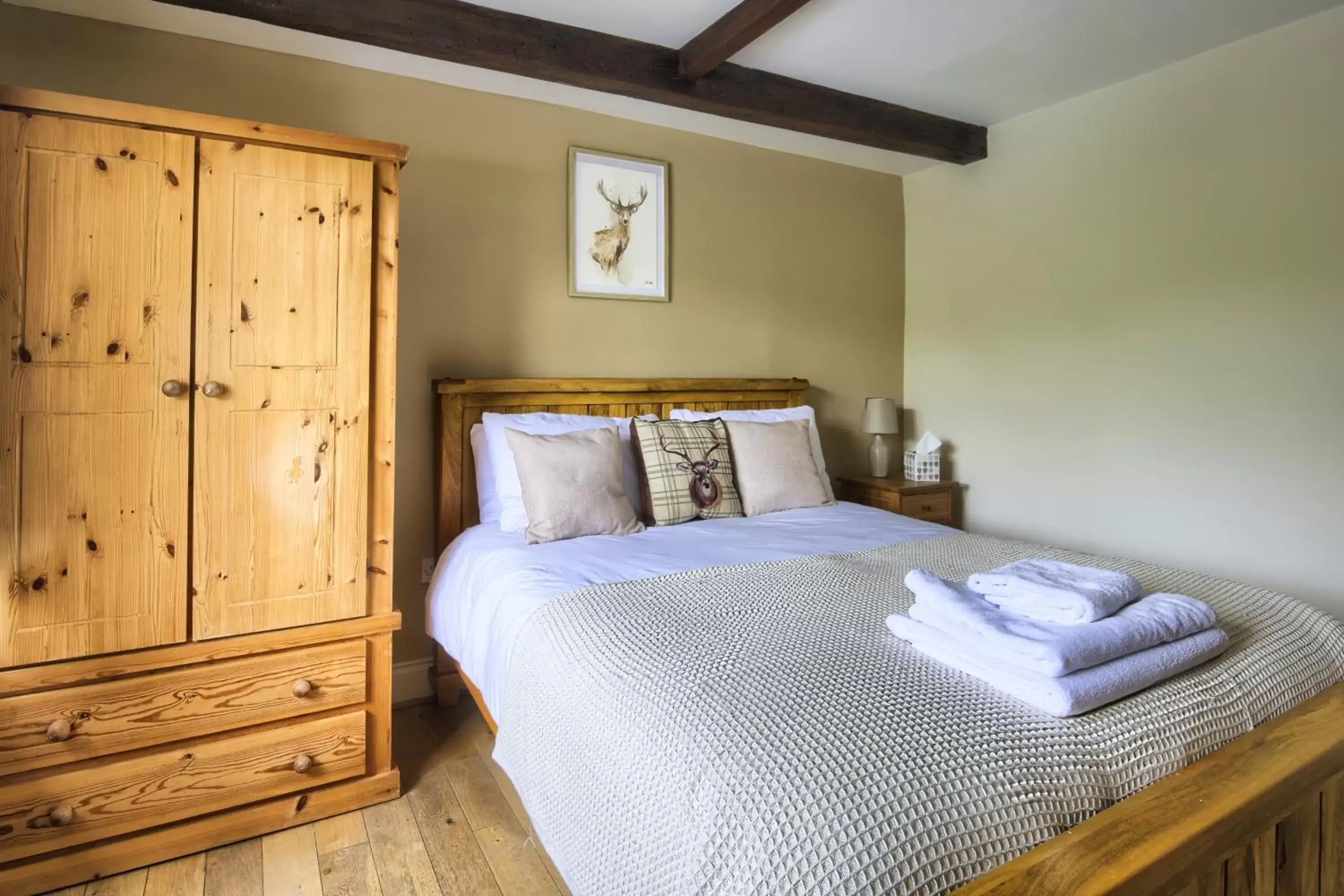 Bed in The New Rushcart Inn & Country Dining