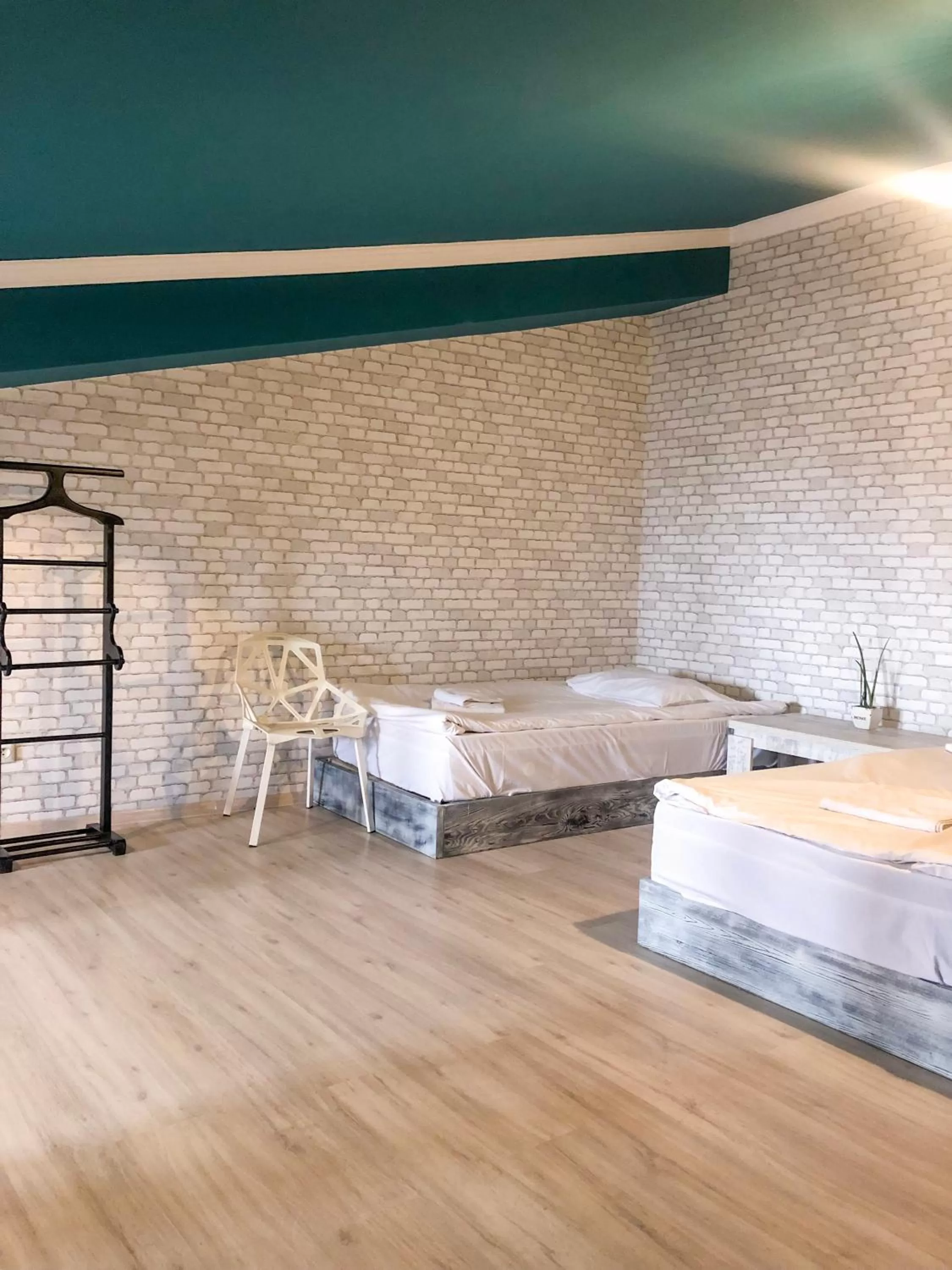 Seating area, Bed in Check Point Hotel