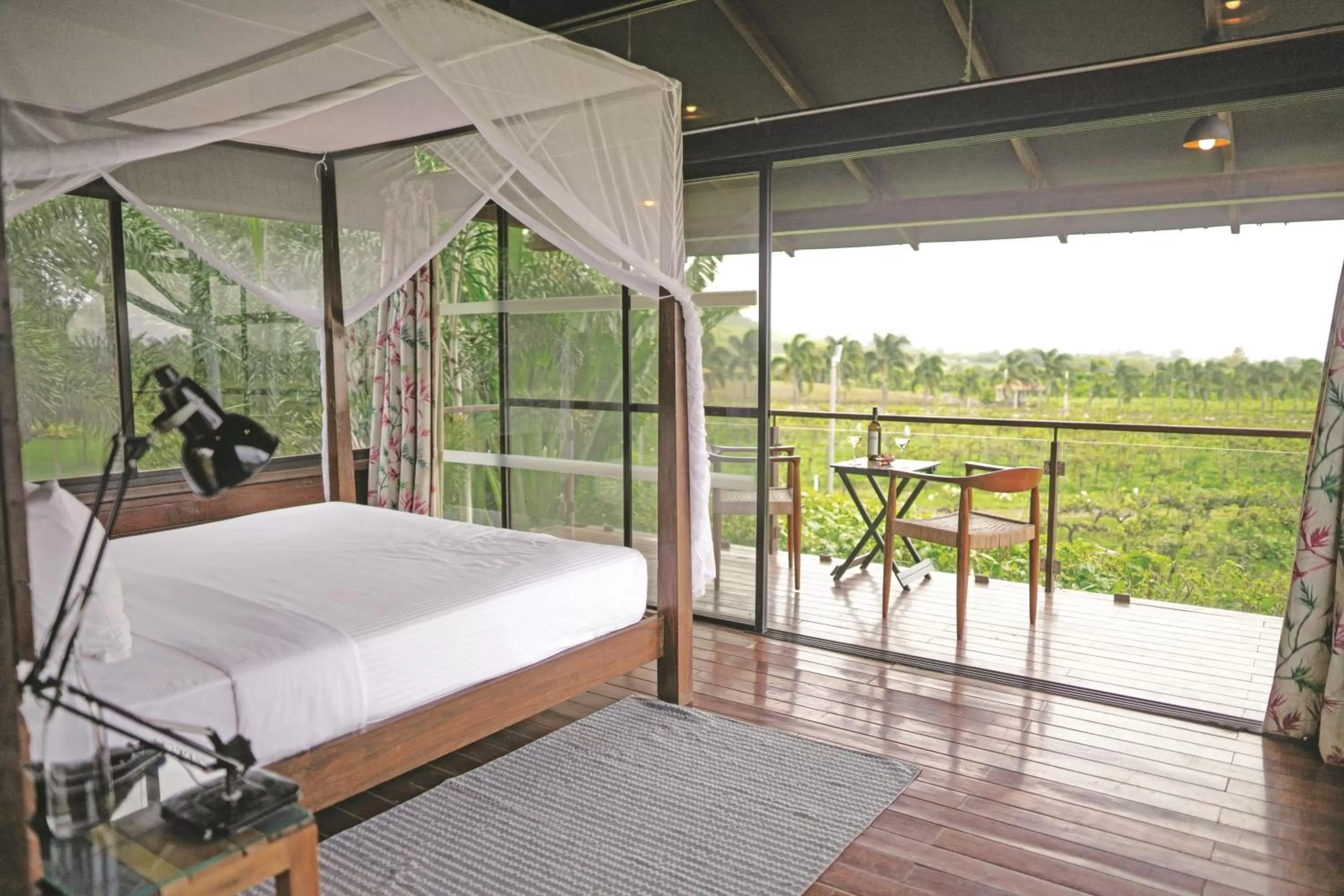 Garden view, Bed in The Source At Sula